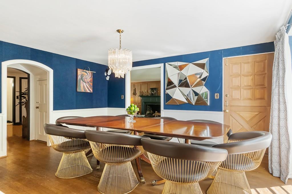 107 Independence Road Concord, MA 01742 - Photo 9 of 25 a dining room with furniture and wooden floor