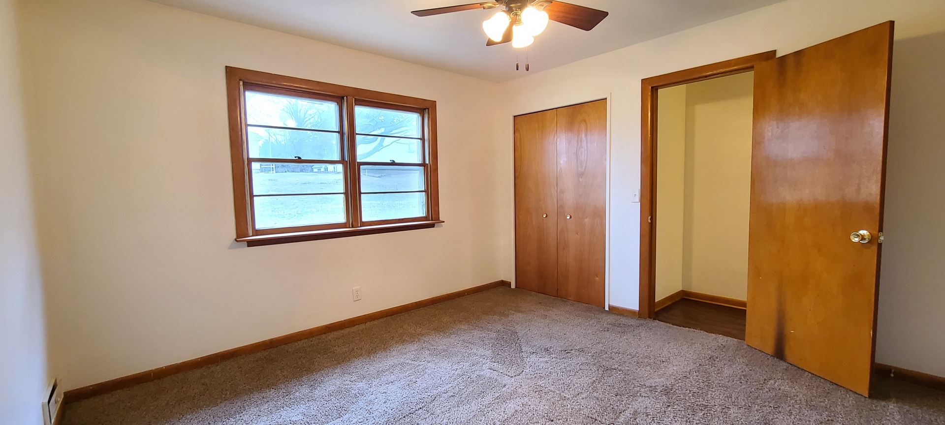 2225 Daysville Road Oregon, IL 61061 - Photo 11 of 28 an empty room with windows and closet