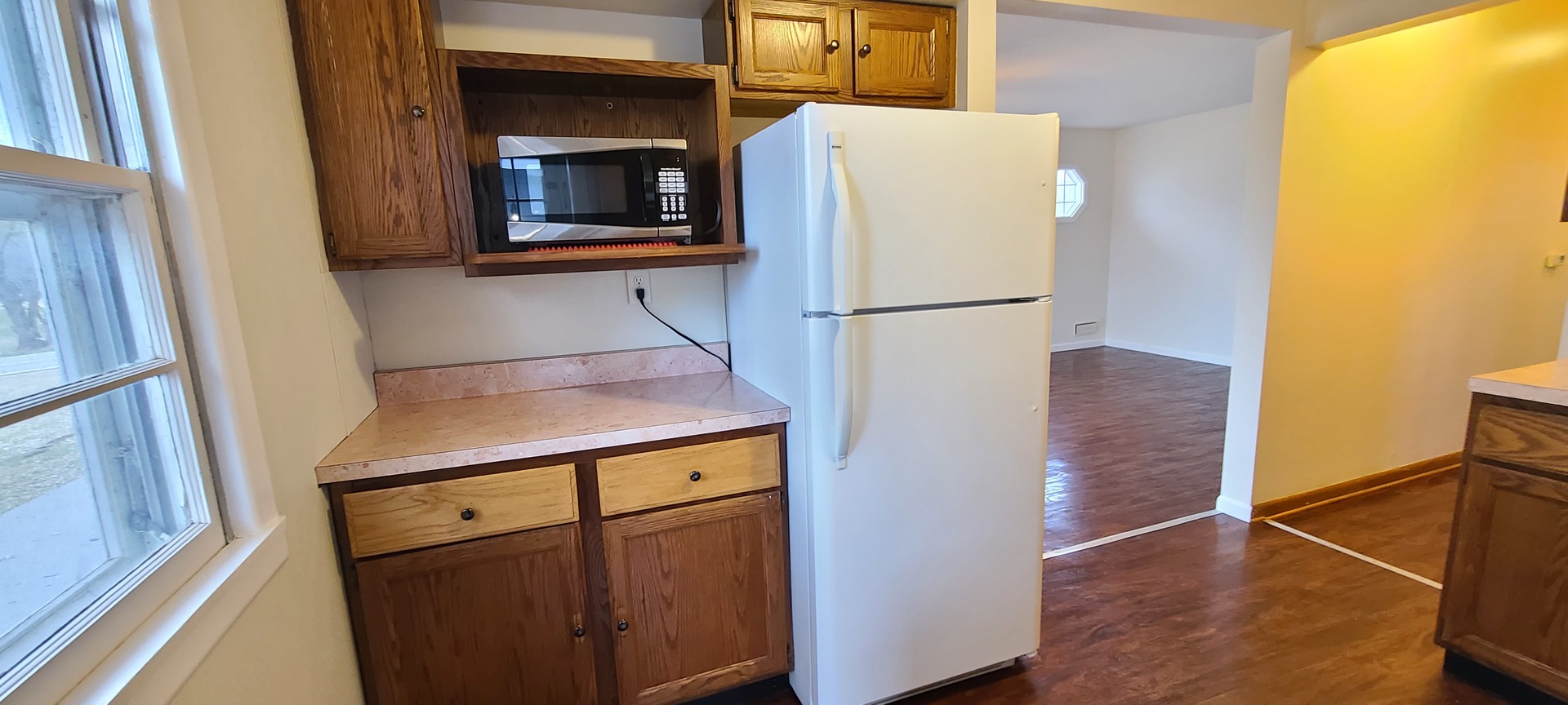 2225 Daysville Road Oregon, IL 61061 - Photo 21 of 28 a white refrigerator freezer and a stove sitting inside of a kitchen