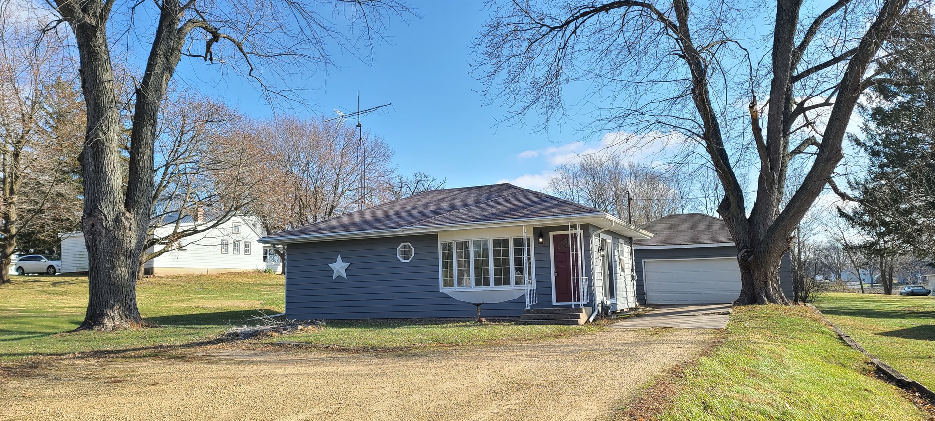 2225 Daysville Road Oregon, IL 61061 - Photo 22 of 28 a view of a house with a large tree and a yard