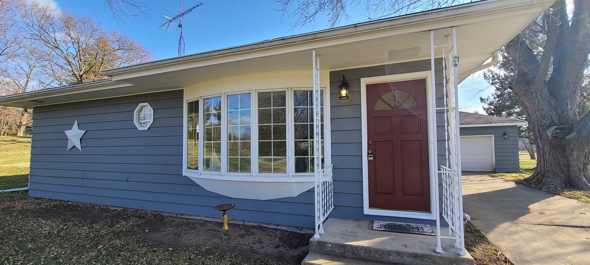 2225 Daysville Road Oregon, IL 61061 - Photo 27 of 28 a front view of a house with a wooden fence