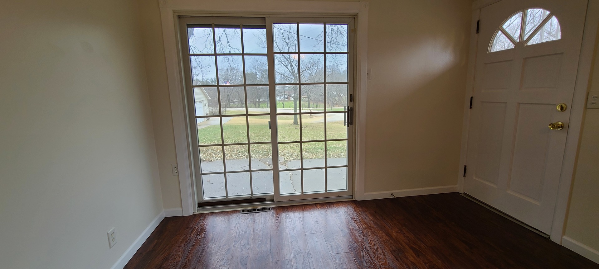 2225 Daysville Road Oregon, IL 61061 - Photo 4 of 28 an empty room with wooden floor and windows