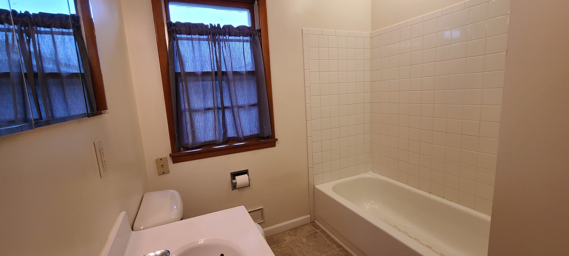 2225 Daysville Road Oregon, IL 61061 - Photo 7 of 28 a bathroom with a bathtub a sink a toilet and a shower