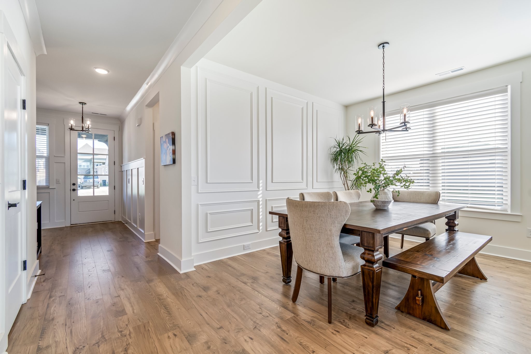 4028 John Marsh Road Spring Hill, TN 37174 - Photo 12 of 62 a view of a dining room with furniture window and wooden floor