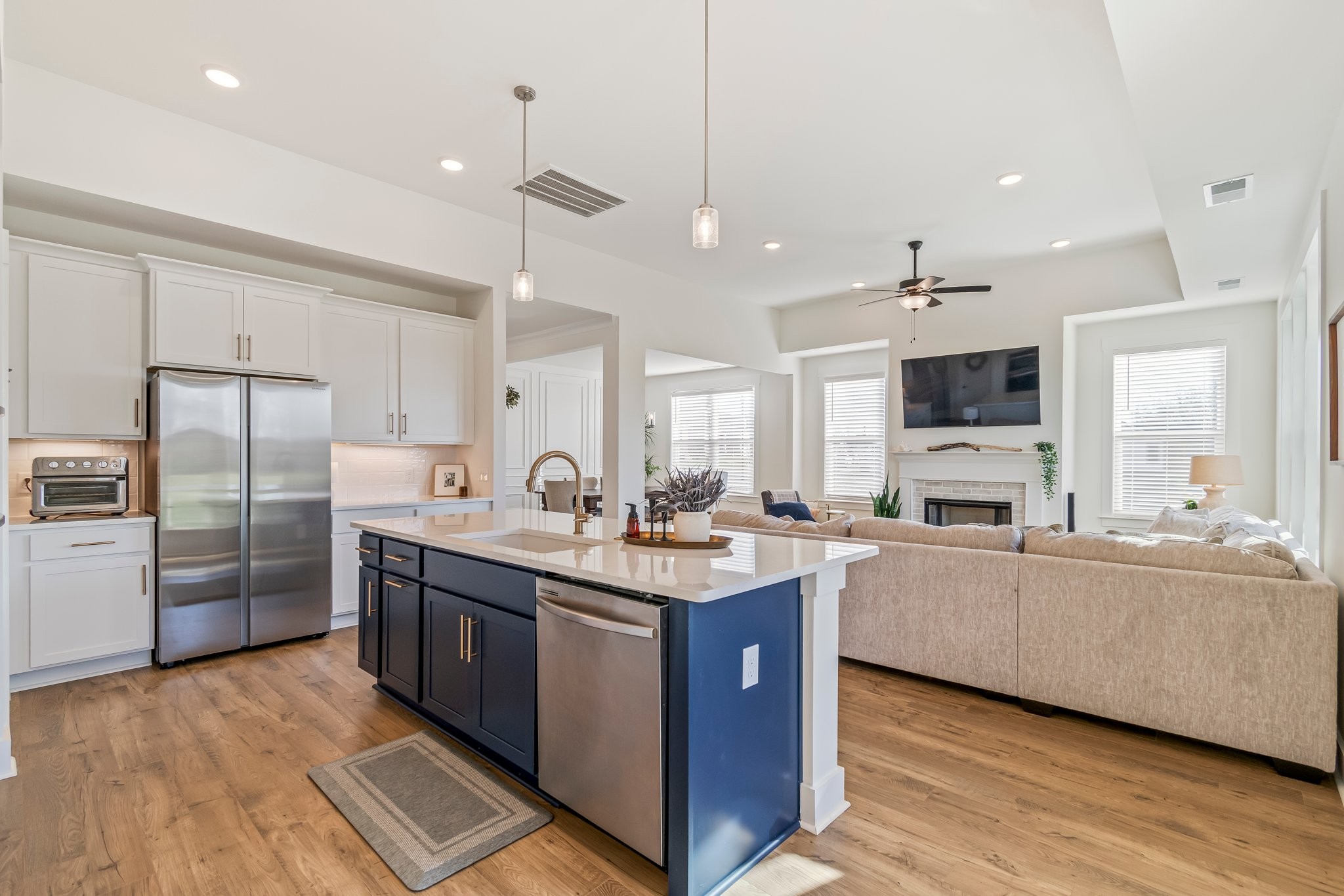 4028 John Marsh Road Spring Hill, TN 37174 - Photo 22 of 62 a kitchen with stainless steel appliances granite countertop a sink a stove and a refrigerator
