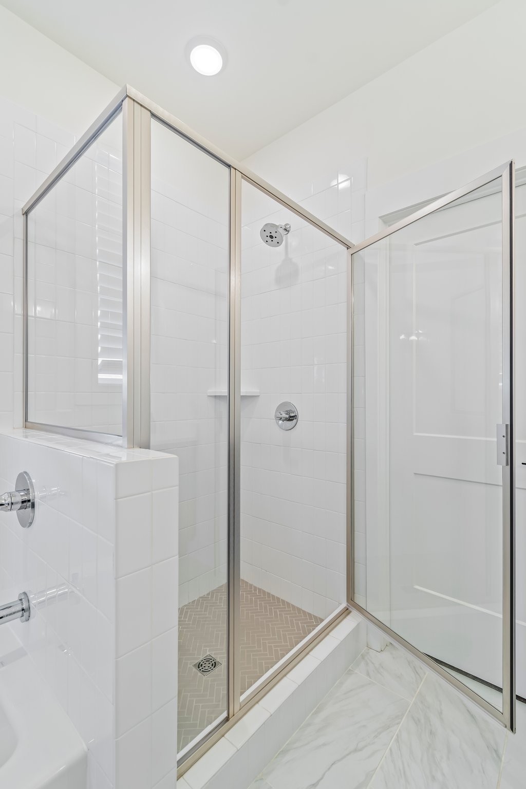 4028 John Marsh Road Spring Hill, TN 37174 - Photo 33 of 62 a bathroom with a shower and a glass door