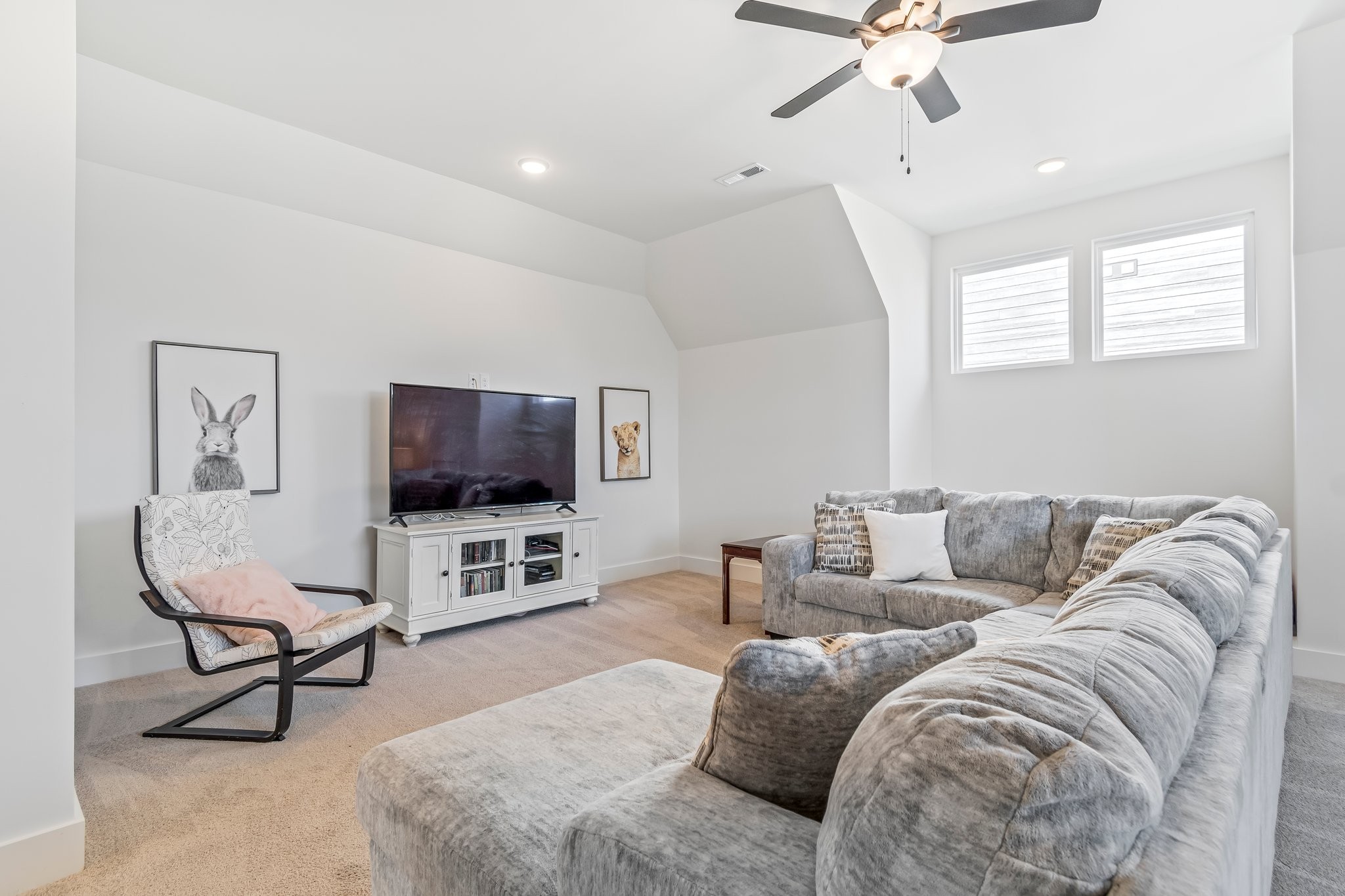 4028 John Marsh Road Spring Hill, TN 37174 - Photo 35 of 62 a living room with furniture and a flat screen tv