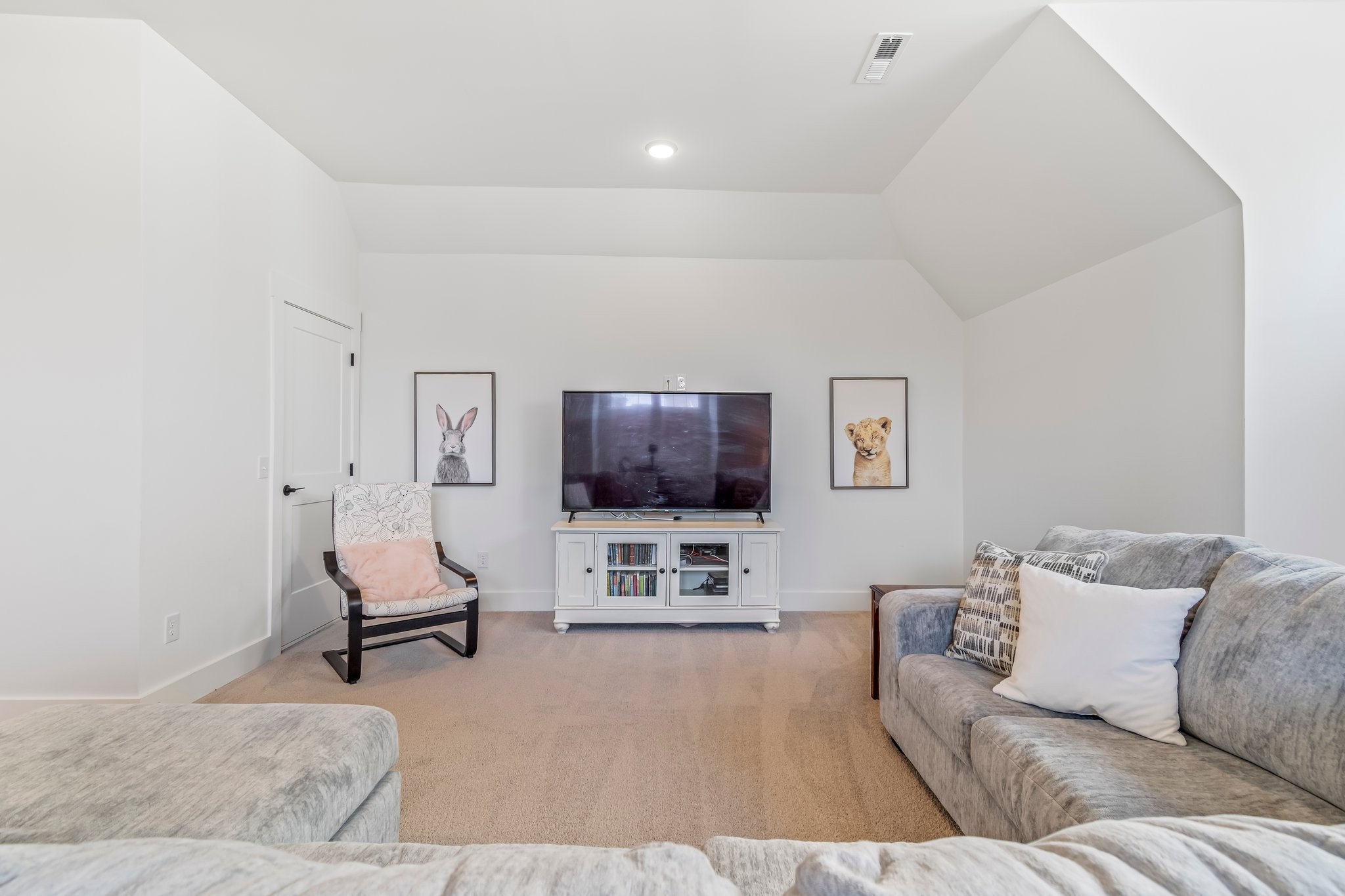 4028 John Marsh Road Spring Hill, TN 37174 - Photo 36 of 62 a living room with furniture and a flat screen tv