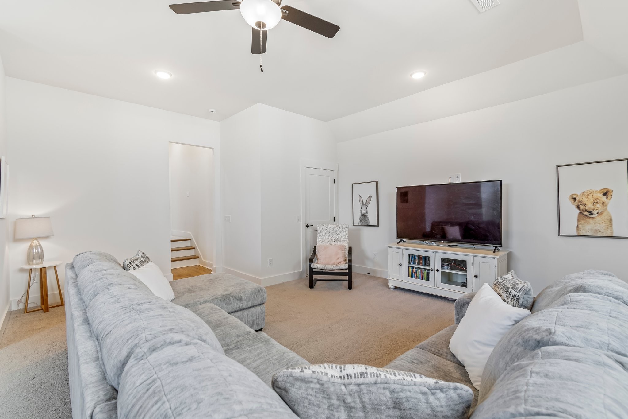 4028 John Marsh Road Spring Hill, TN 37174 - Photo 37 of 62 a living room with furniture and a flat screen tv