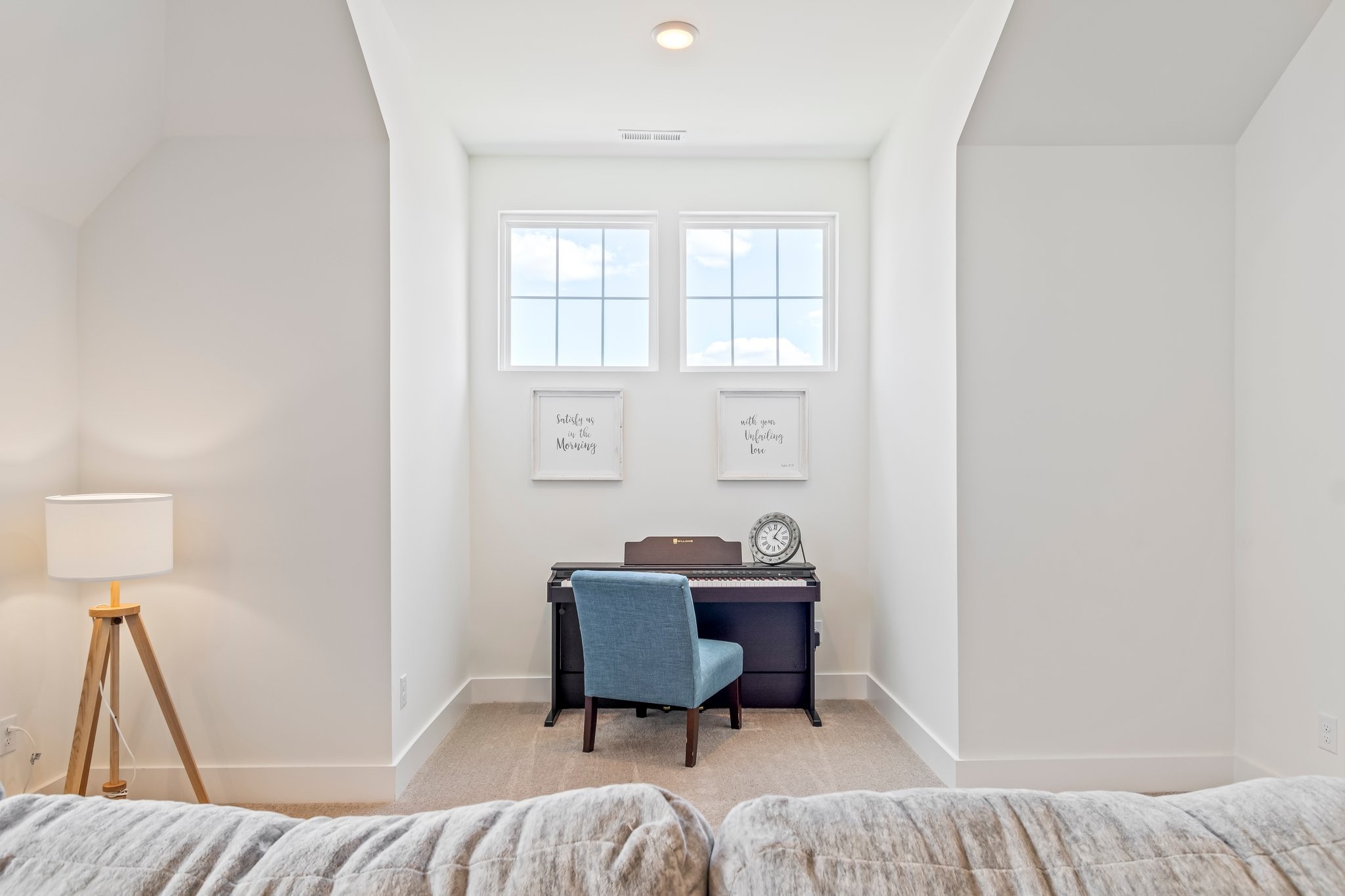 4028 John Marsh Road Spring Hill, TN 37174 - Photo 39 of 62 a bedroom with a bed and a chair