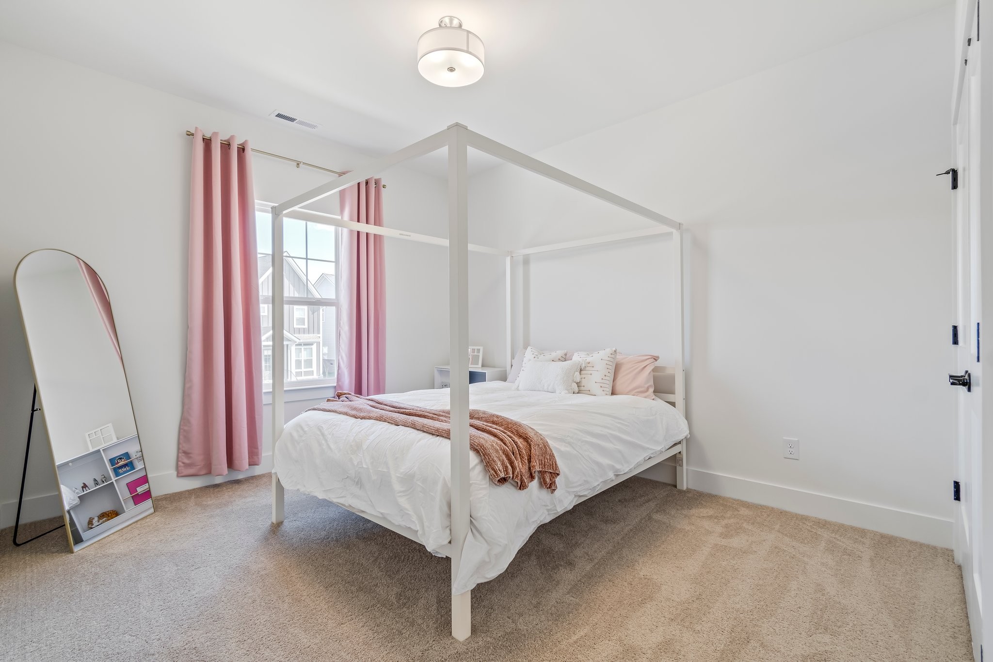 4028 John Marsh Road Spring Hill, TN 37174 - Photo 48 of 62 a bed room with a bed and a mirror