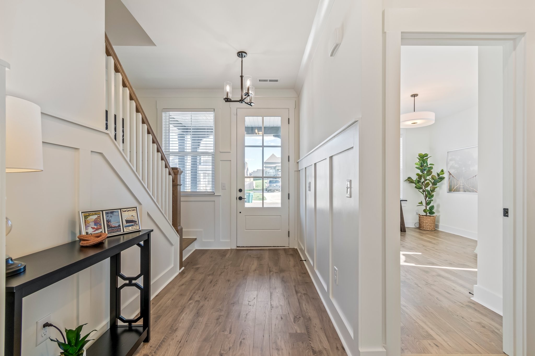 4028 John Marsh Road Spring Hill, TN 37174 - Photo 5 of 62 a view of entryway with wooden floor and stairs