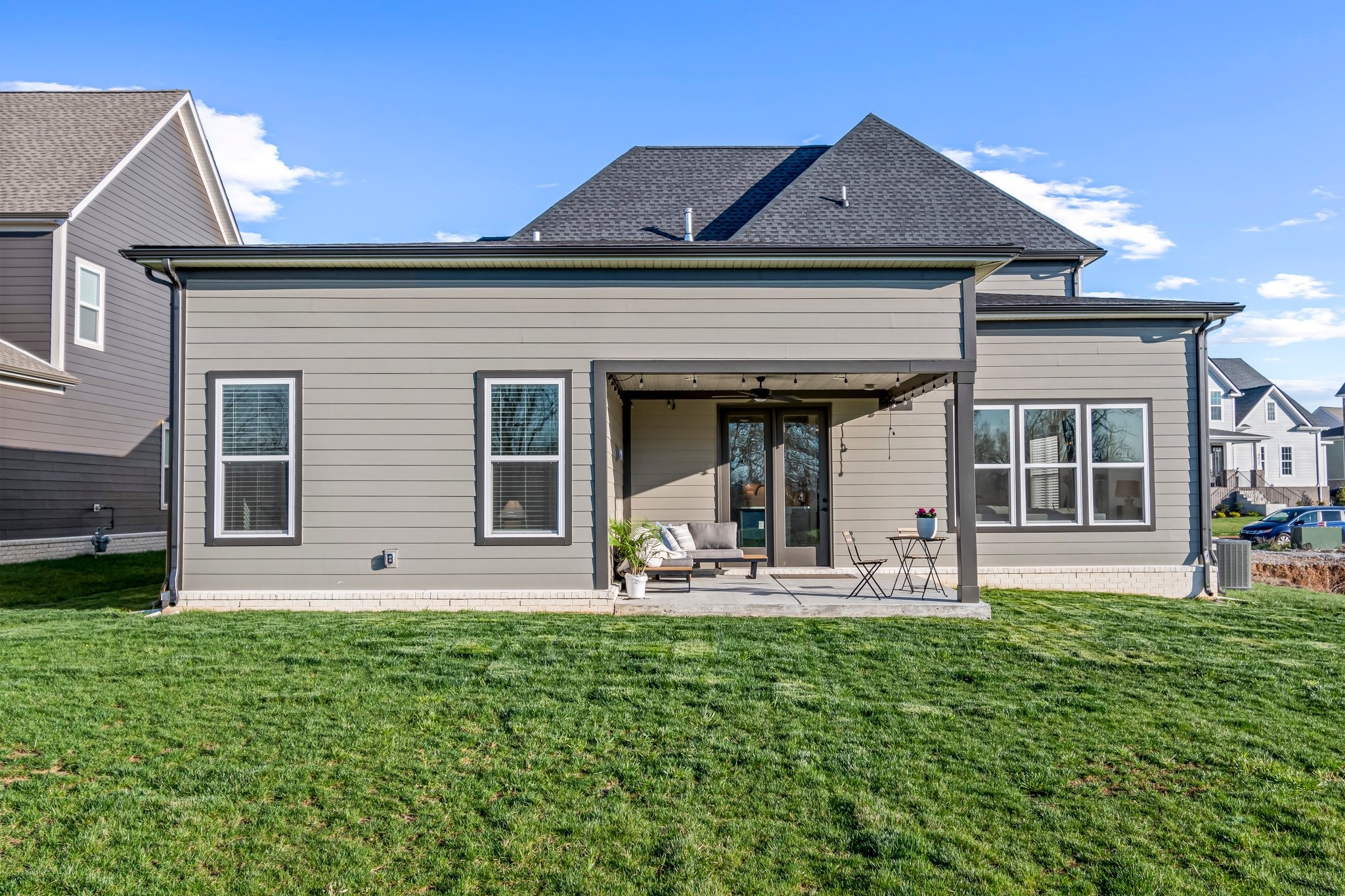 4028 John Marsh Road Spring Hill, TN 37174 - Photo 56 of 62 a front view of a house with garden and porch