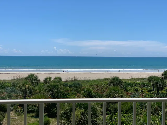a view of a balcony with an outdoor space
