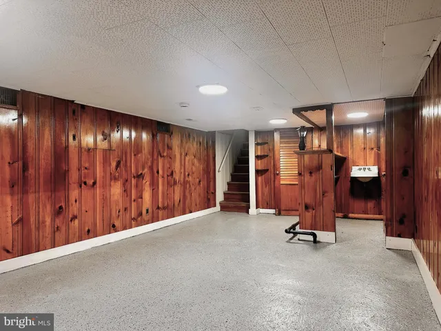 a view of a lake with houses in the back