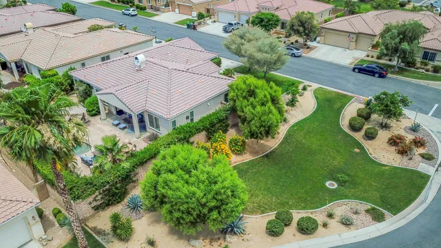 an aerial view of a house with garden