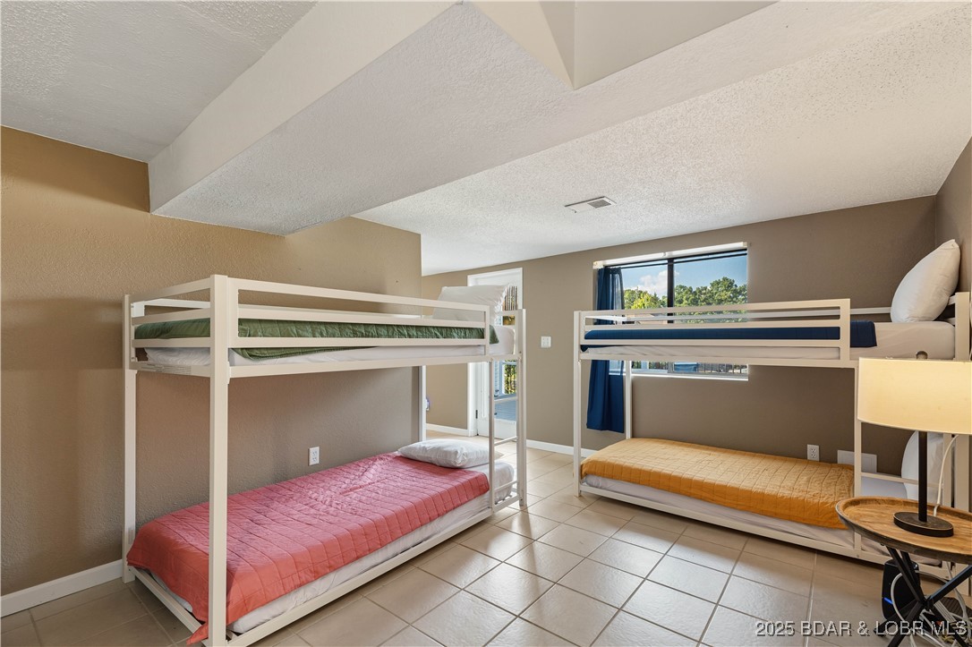 523 Lucy Road Lake Ozark, MO 65049 - Photo 20 of 61 Bunk room downstairs