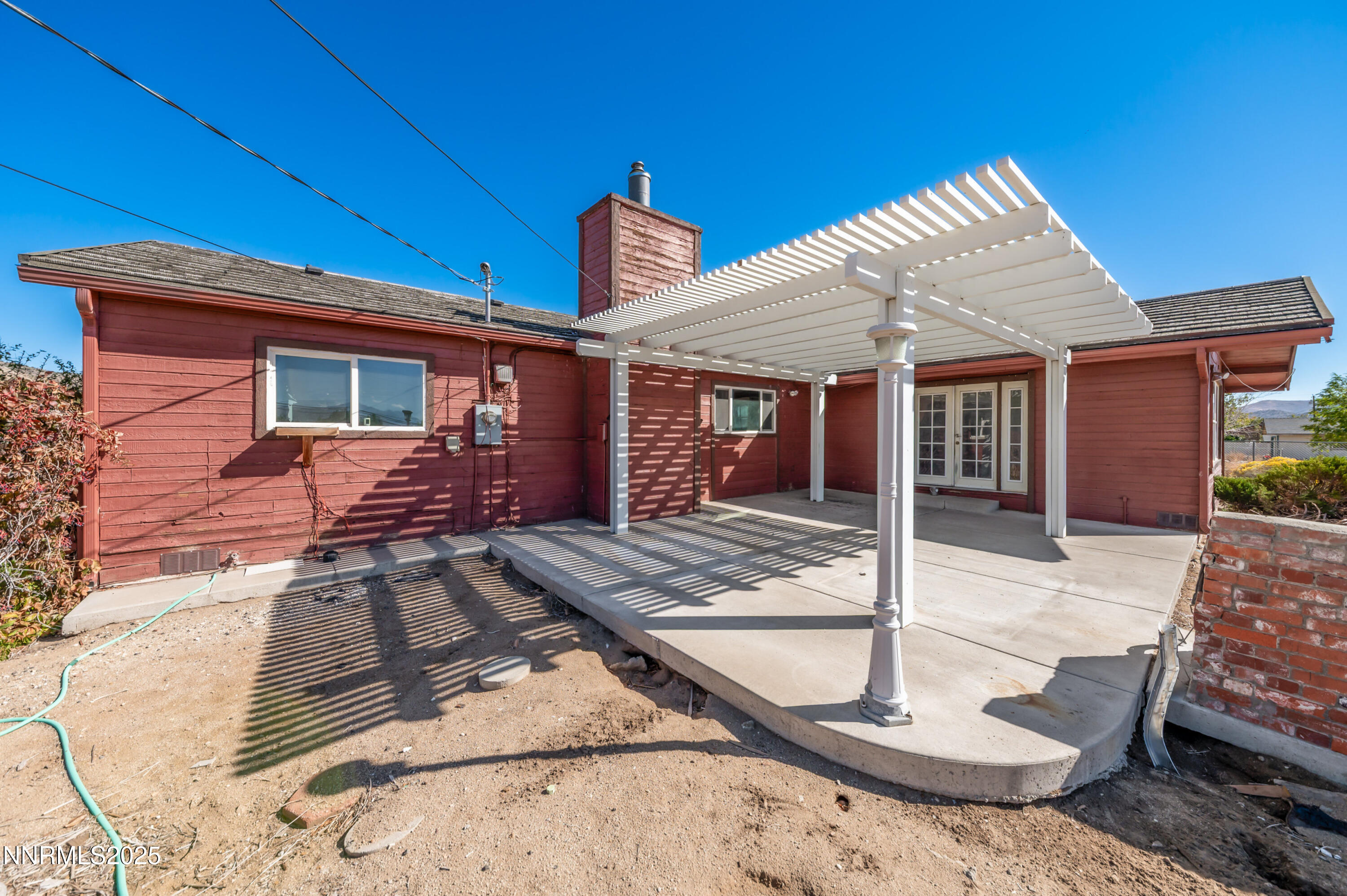 11890 Chesapeake Drive Reno, NV 89506 - Photo 18 of 33 a view of a house with backyard and porch