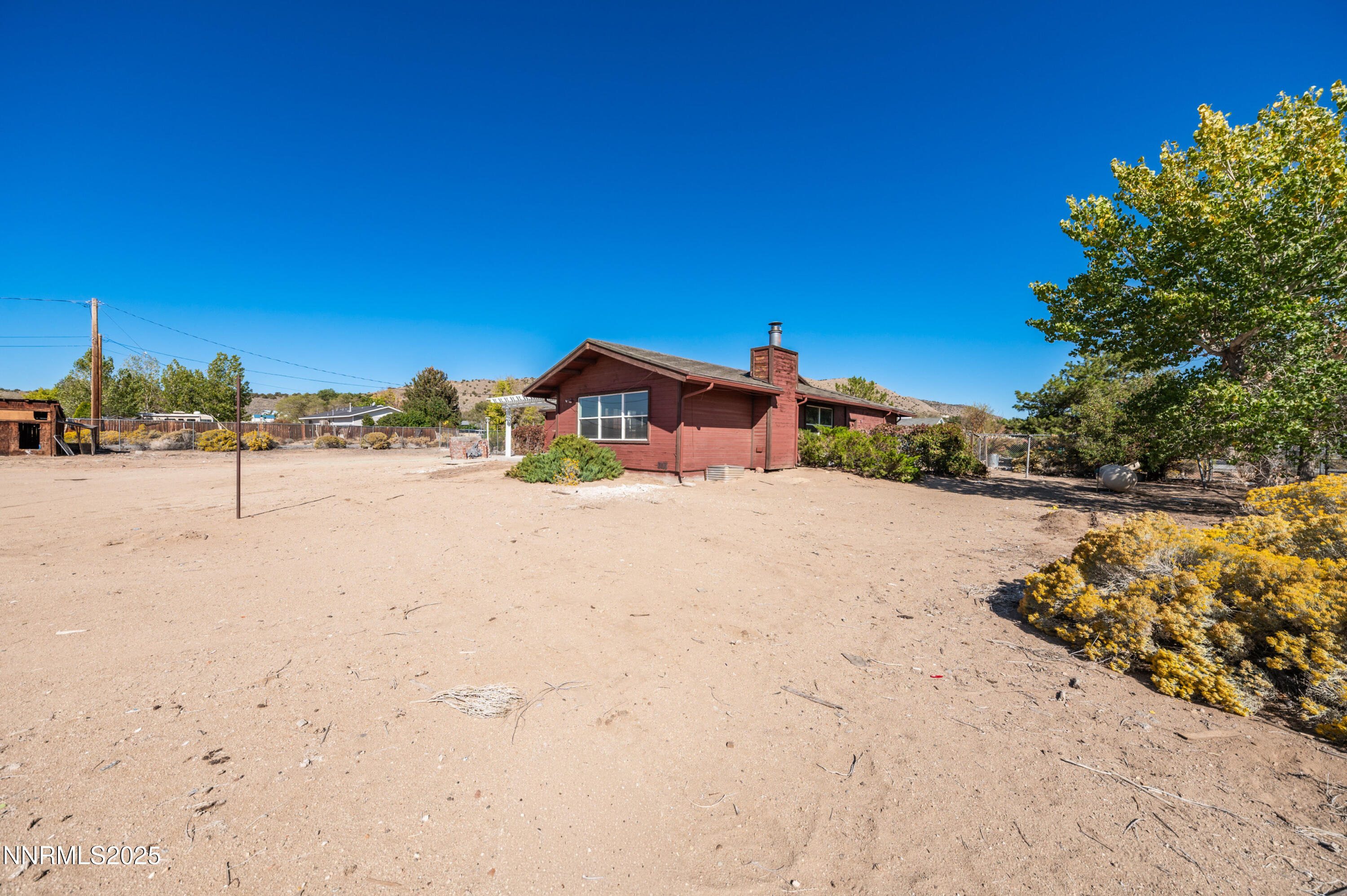 11890 Chesapeake Drive Reno, NV 89506 - Photo 19 of 33 a view of a road with a yard