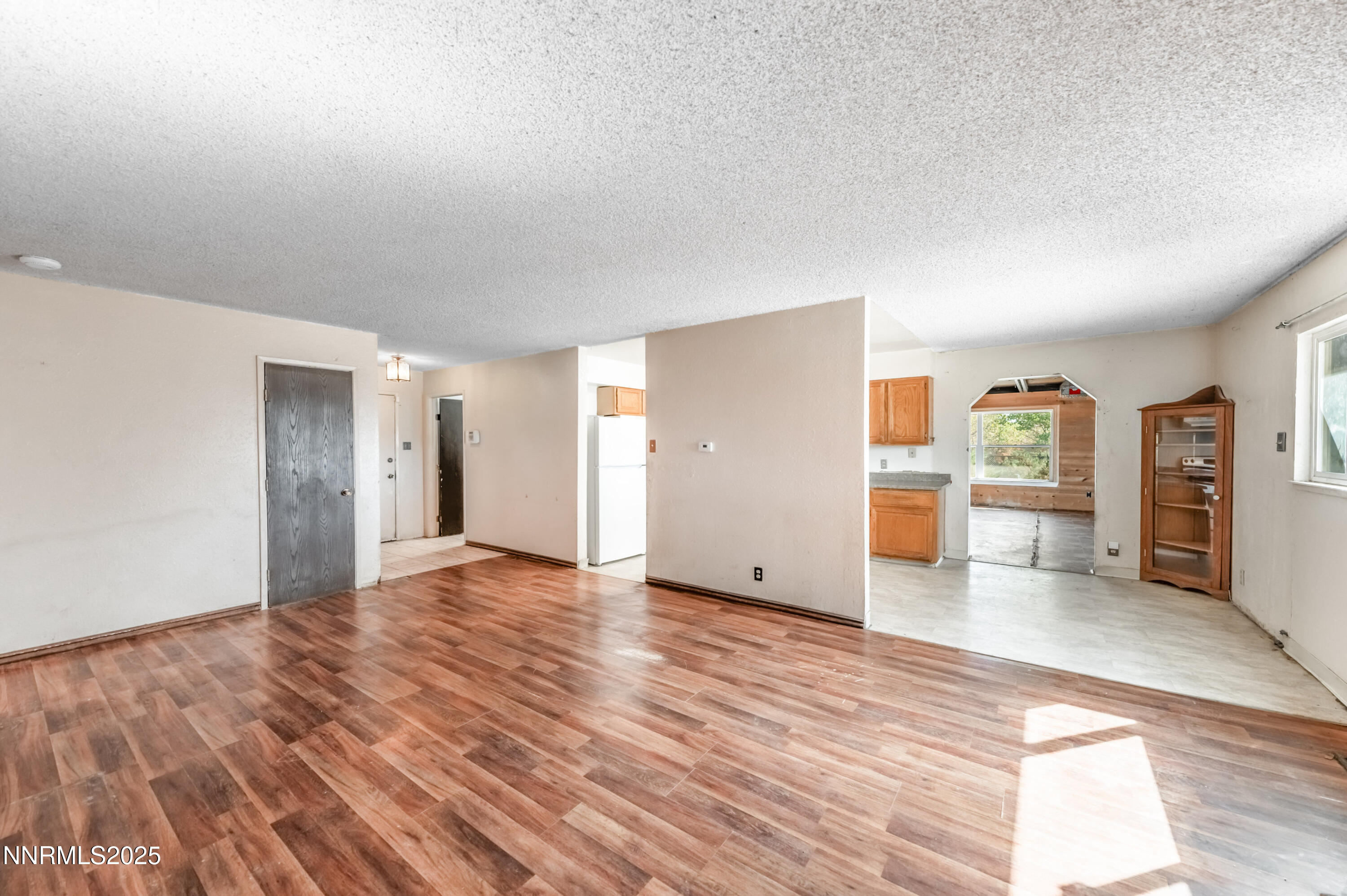 11890 Chesapeake Drive Reno, NV 89506 - Photo 4 of 33 a view of a livingroom with wooden floor