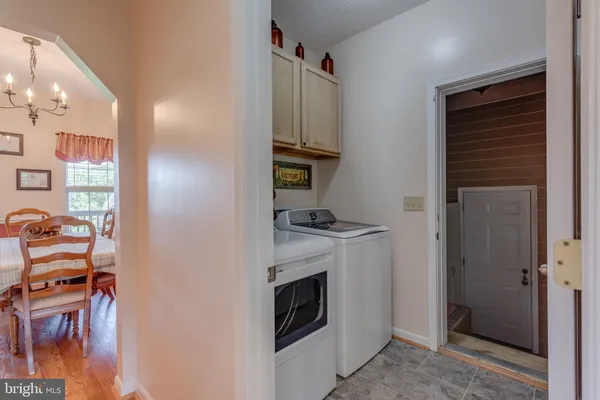 a bedroom with furniture and a bed