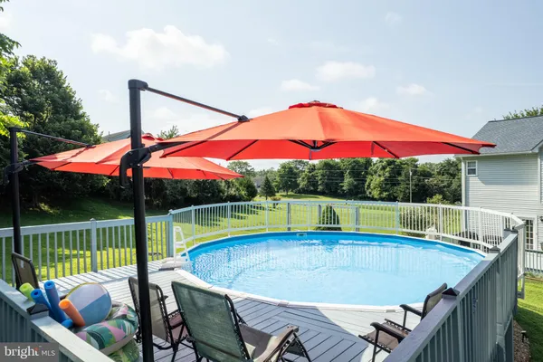 a view of a lake with a yard