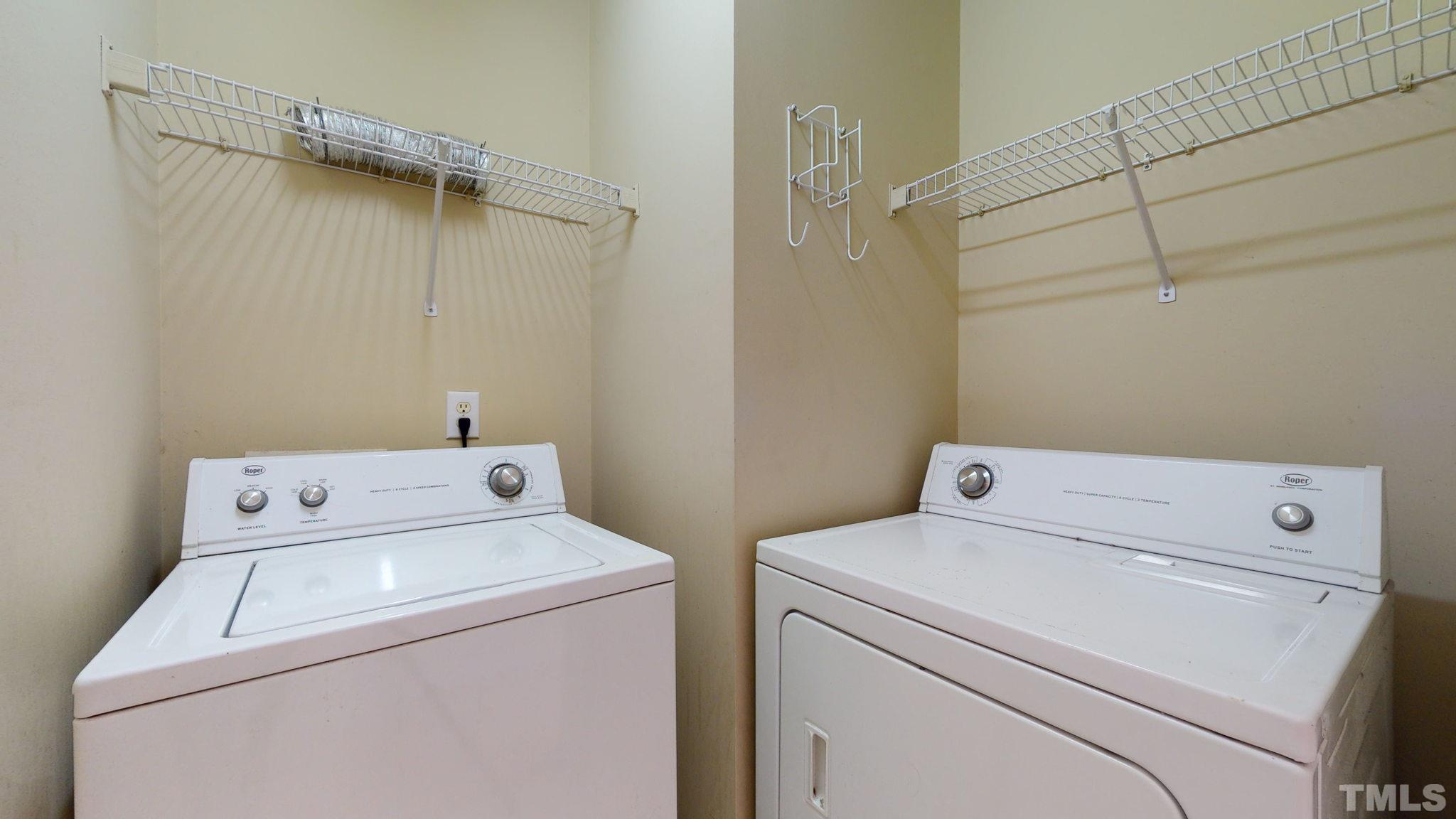 2117 Metacomet Way Raleigh, NC 27604 - Photo 22 of 28 a utility room with dryer and washer
