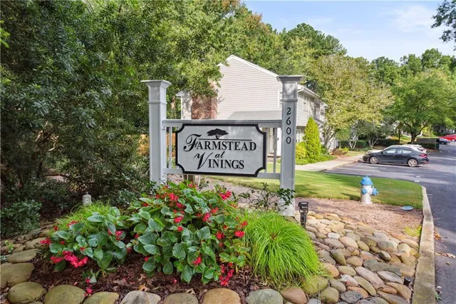 a sign on the side of the road