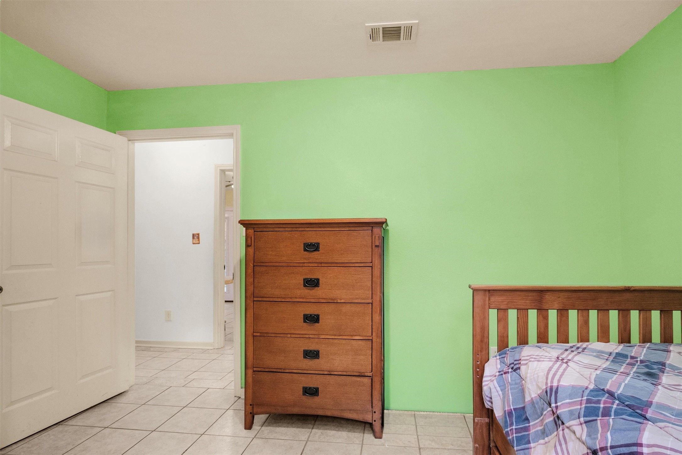 528 Catfish Lane Conroe, TX 77384 - Photo 12 of 49 a view of a bedroom with closet and bed