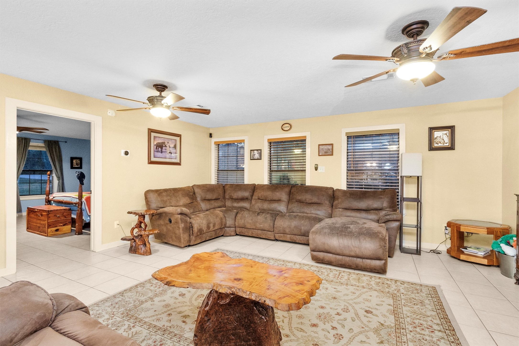 528 Catfish Lane Conroe, TX 77384 - Photo 13 of 49 a living room with furniture and a large mirror with wooden floor