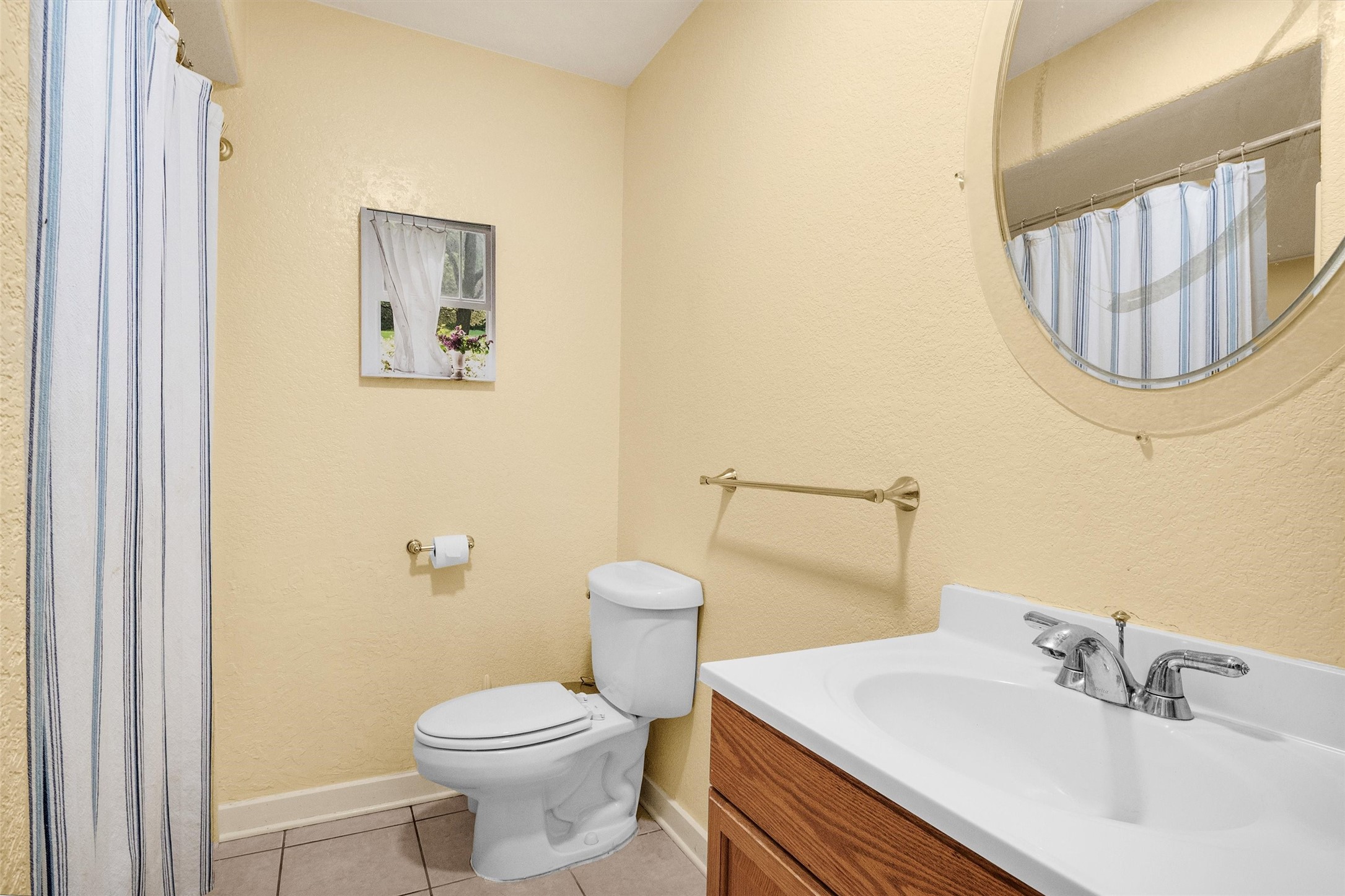 528 Catfish Lane Conroe, TX 77384 - Photo 20 of 49 a bathroom with a sink a toilet and mirror