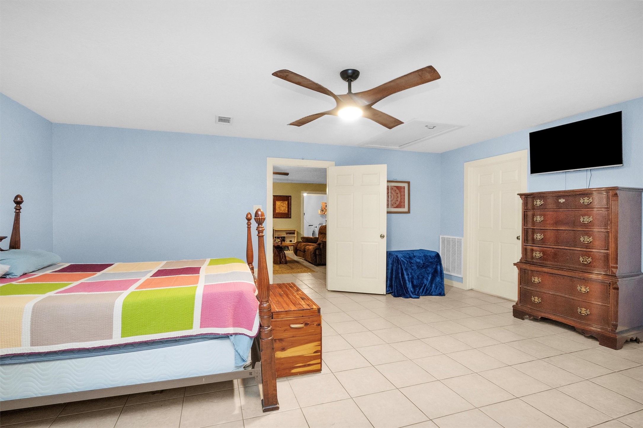 528 Catfish Lane Conroe, TX 77384 - Photo 23 of 49 a bedroom with a bed and furniture