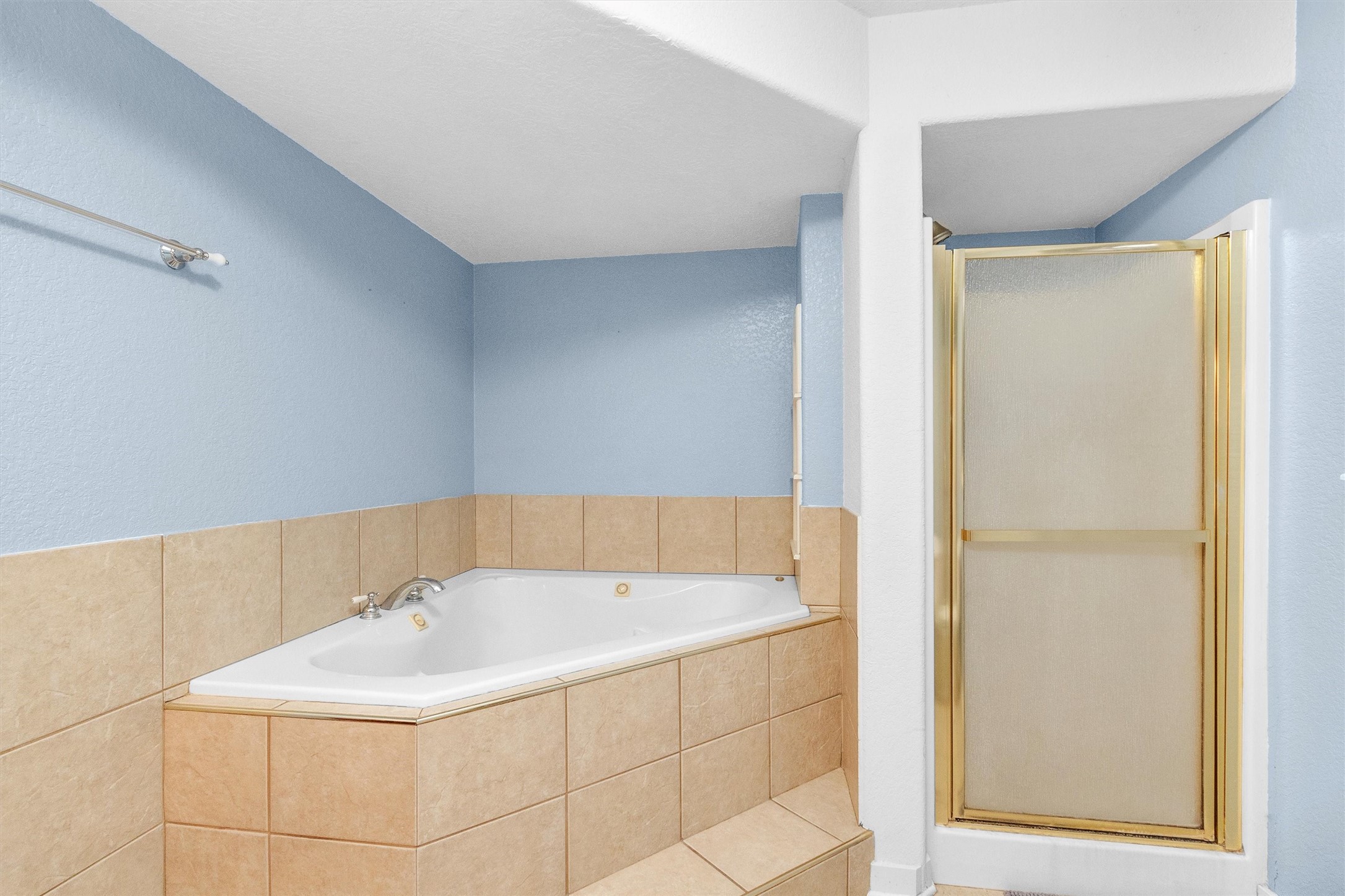 528 Catfish Lane Conroe, TX 77384 - Photo 25 of 49 a bathroom with a sink and a bathtub