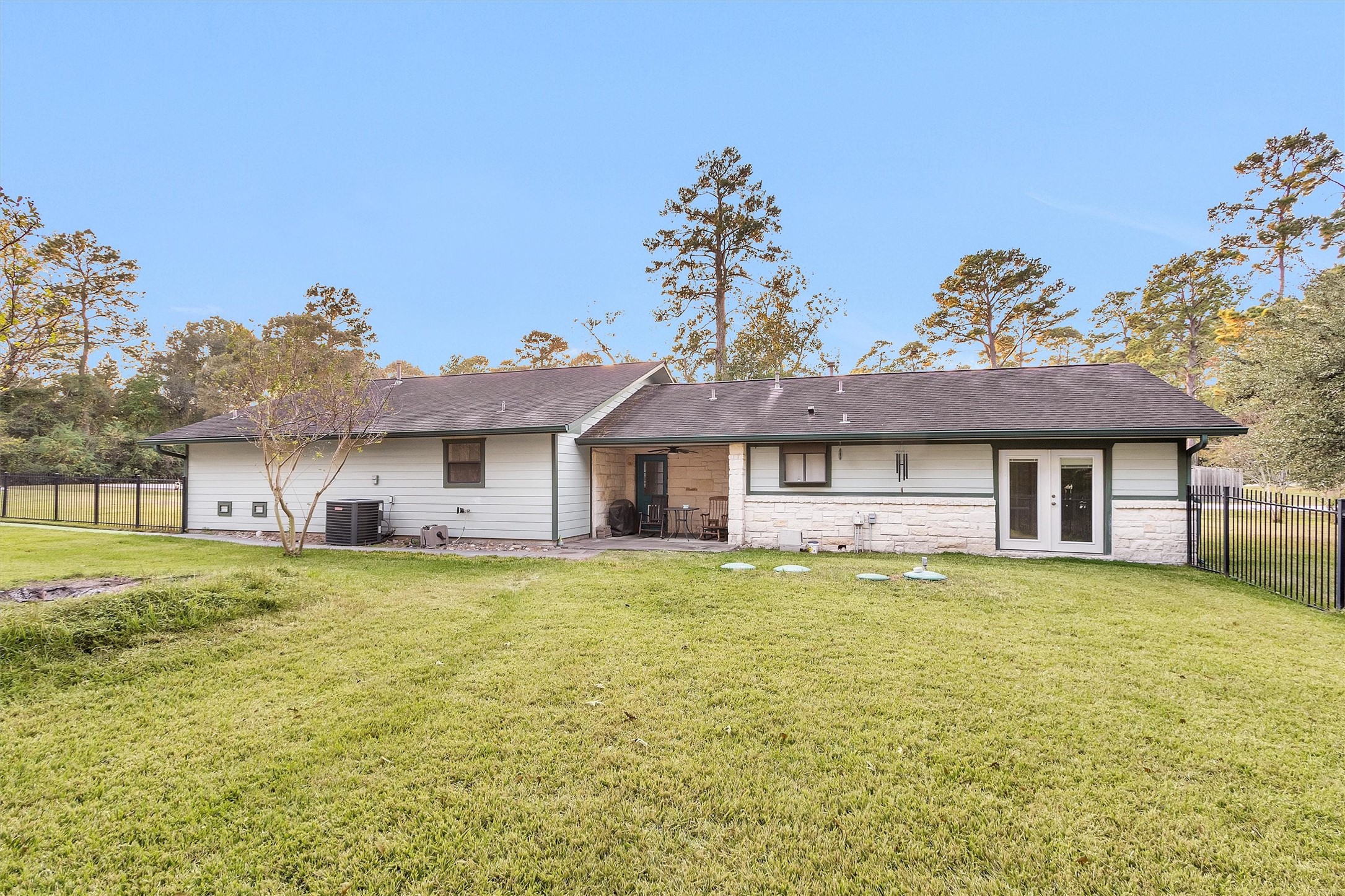 528 Catfish Lane Conroe, TX 77384 - Photo 29 of 49 a house view with a garden space