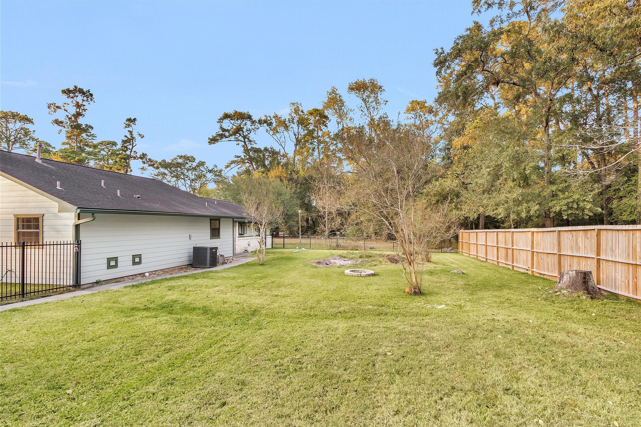 528 Catfish Lane Conroe, TX 77384 - Photo 31 of 49 a view of a house with swimming pool and a yard