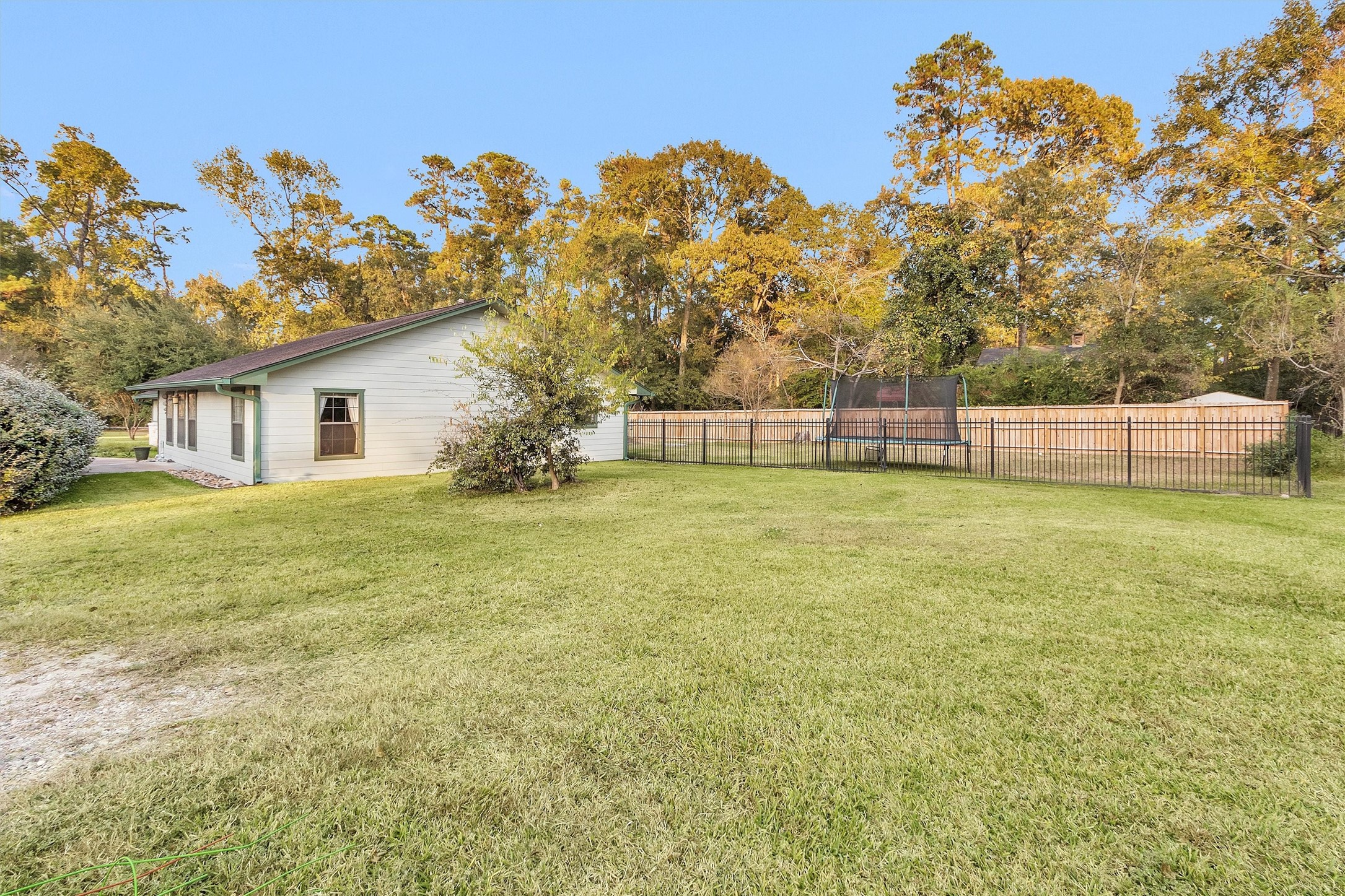 528 Catfish Lane Conroe, TX 77384 - Photo 33 of 49 a view of a house with a yard