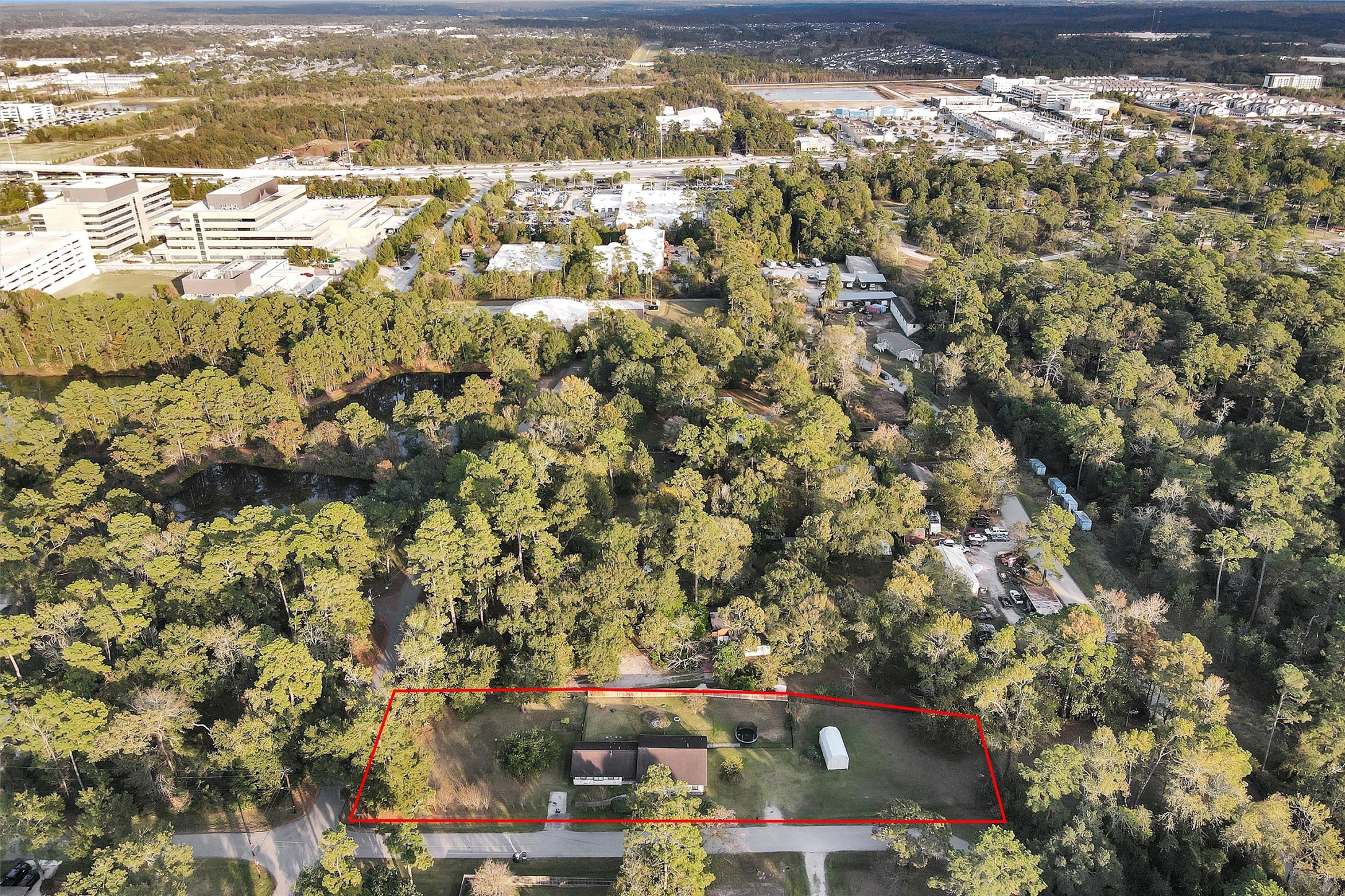 528 Catfish Lane Conroe, TX 77384 - Photo 41 of 49 a view of residential houses with outdoor space and swimming pool