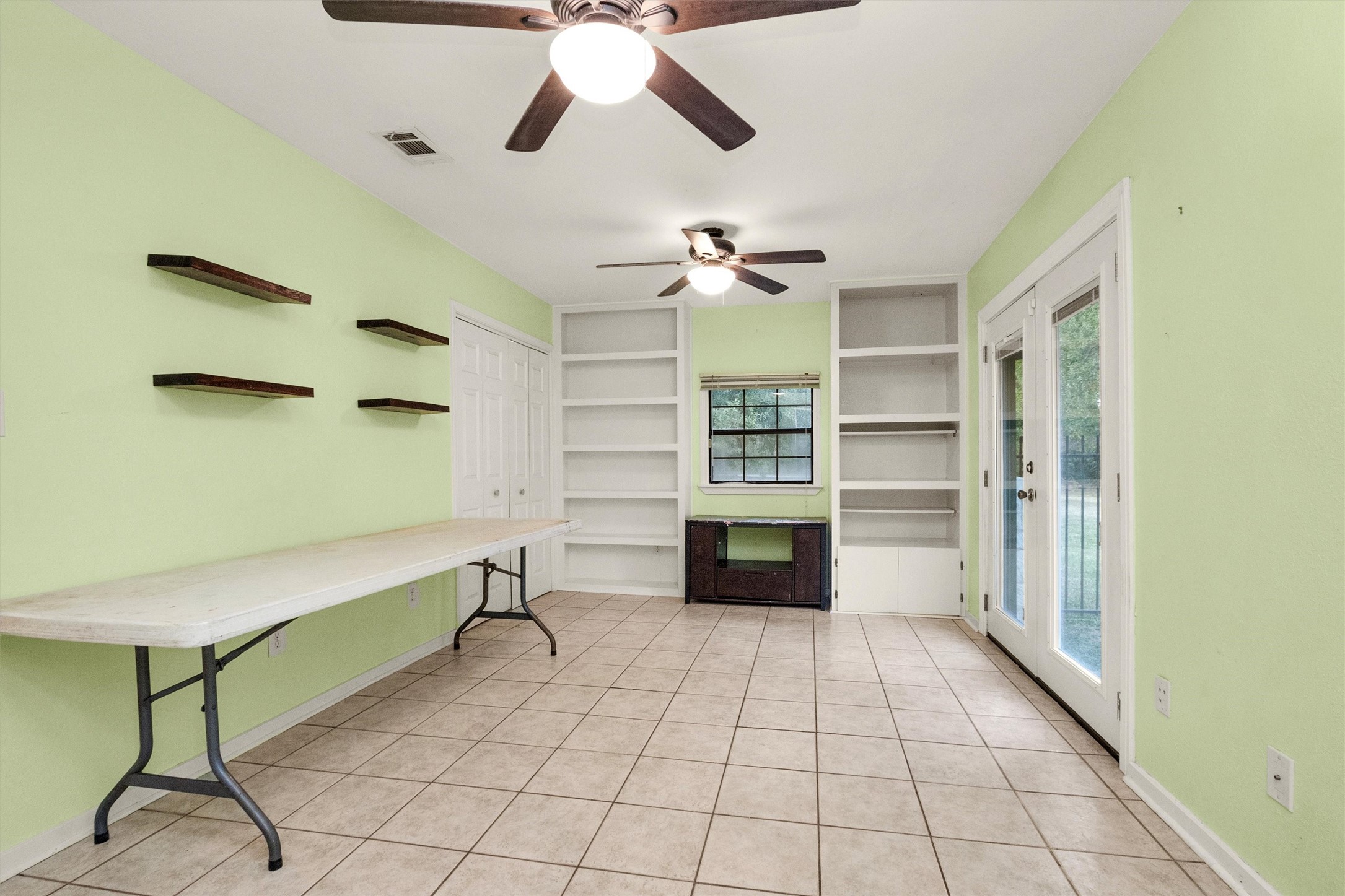 528 Catfish Lane Conroe, TX 77384 - Photo 6 of 49 a view of an empty room with a window