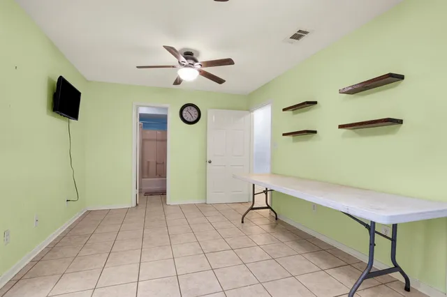 a bathroom with a sink a vanity and a mirror