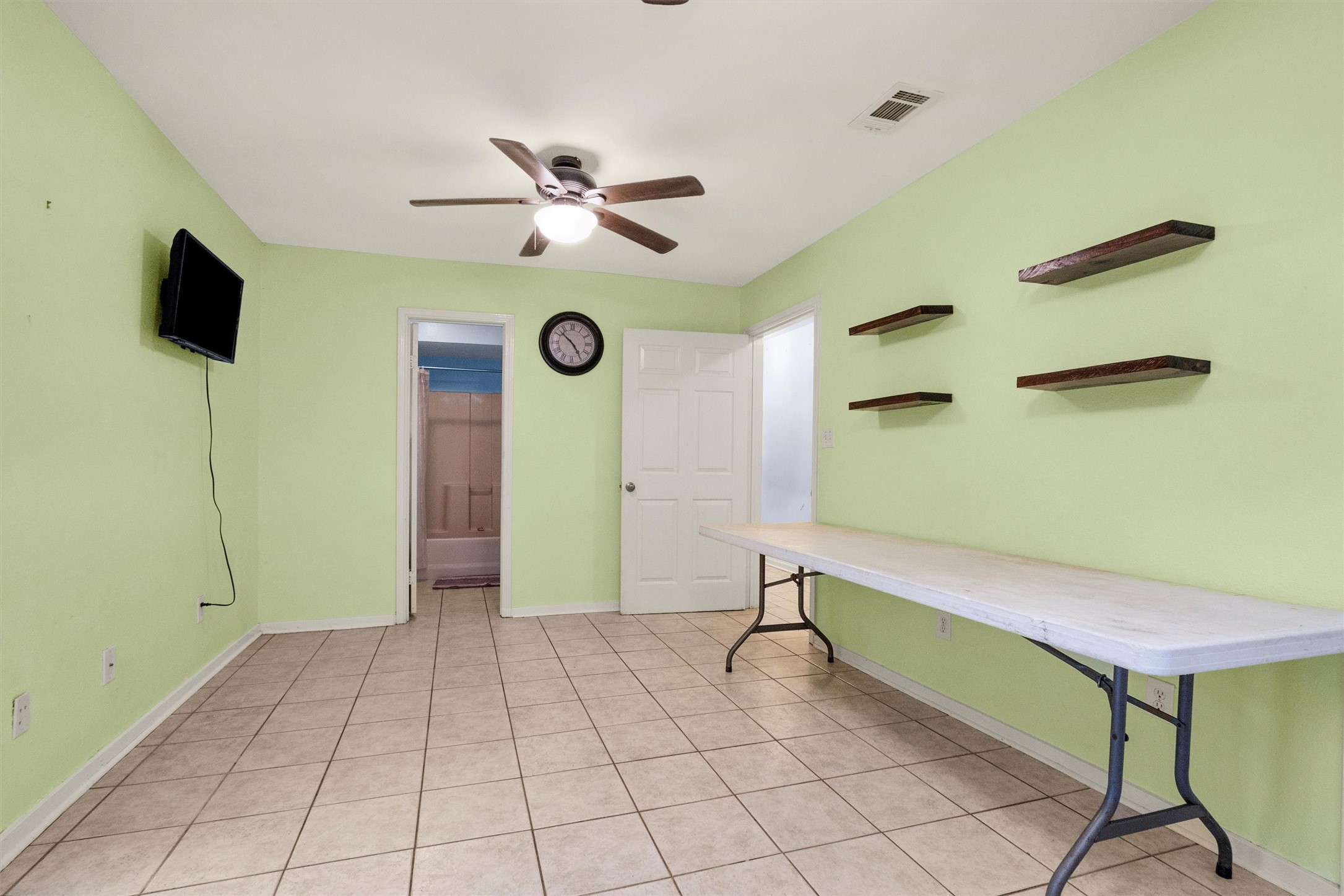 528 Catfish Lane Conroe, TX 77384 - Photo 7 of 49 a view of an empty room with a window