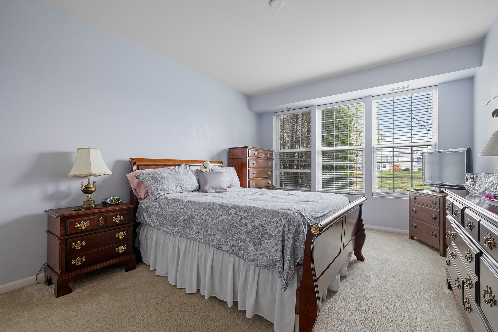 15313 Pinewood Road, Unit 15313 Lockport, IL 60441 - Photo 8 of 15 a bedroom with a bed and a window
