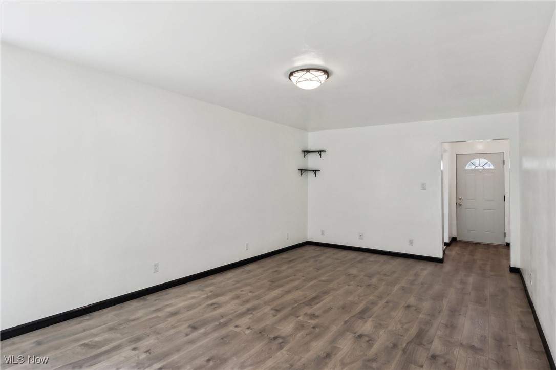 1829 Clyde Road Madison, OH 44057 - Photo 12 of 40 Spare room with hardwood / wood-style flooring