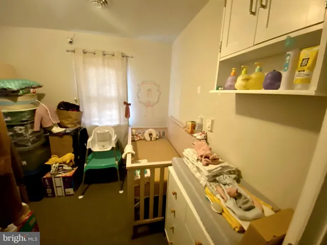 a bathroom with a bathtub and a sink