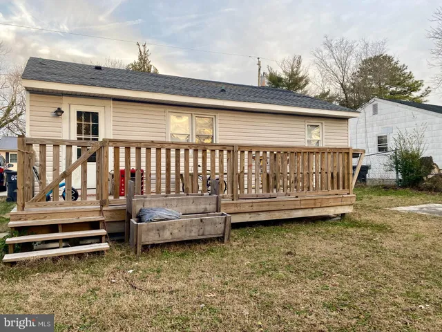 a view of backyard with deck