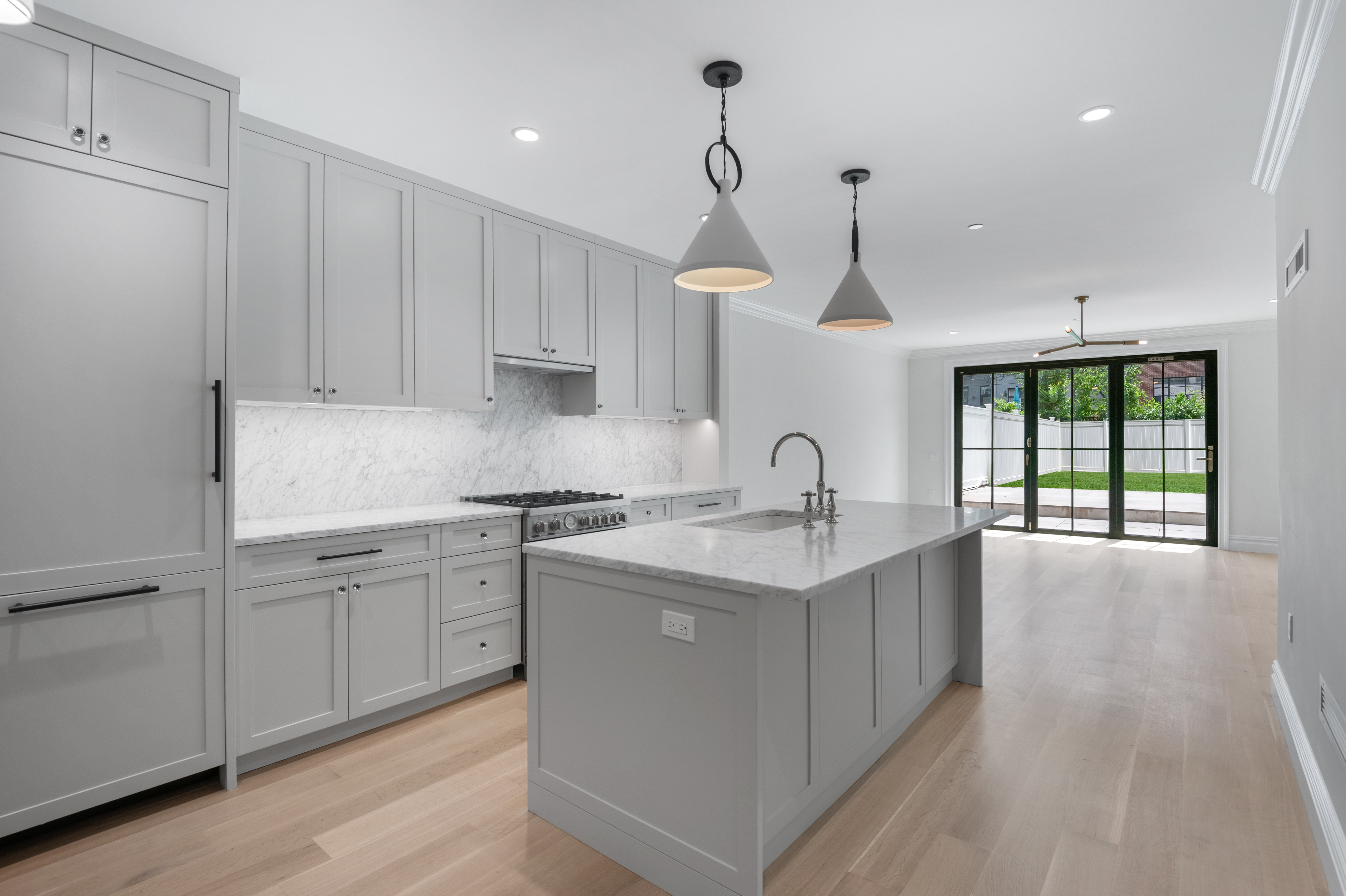 16 2nd Place, Unit RESIDENCE 2 Brooklyn, NY 11231 - Photo 1 of 20 a kitchen that has a sink a stove and cabinets