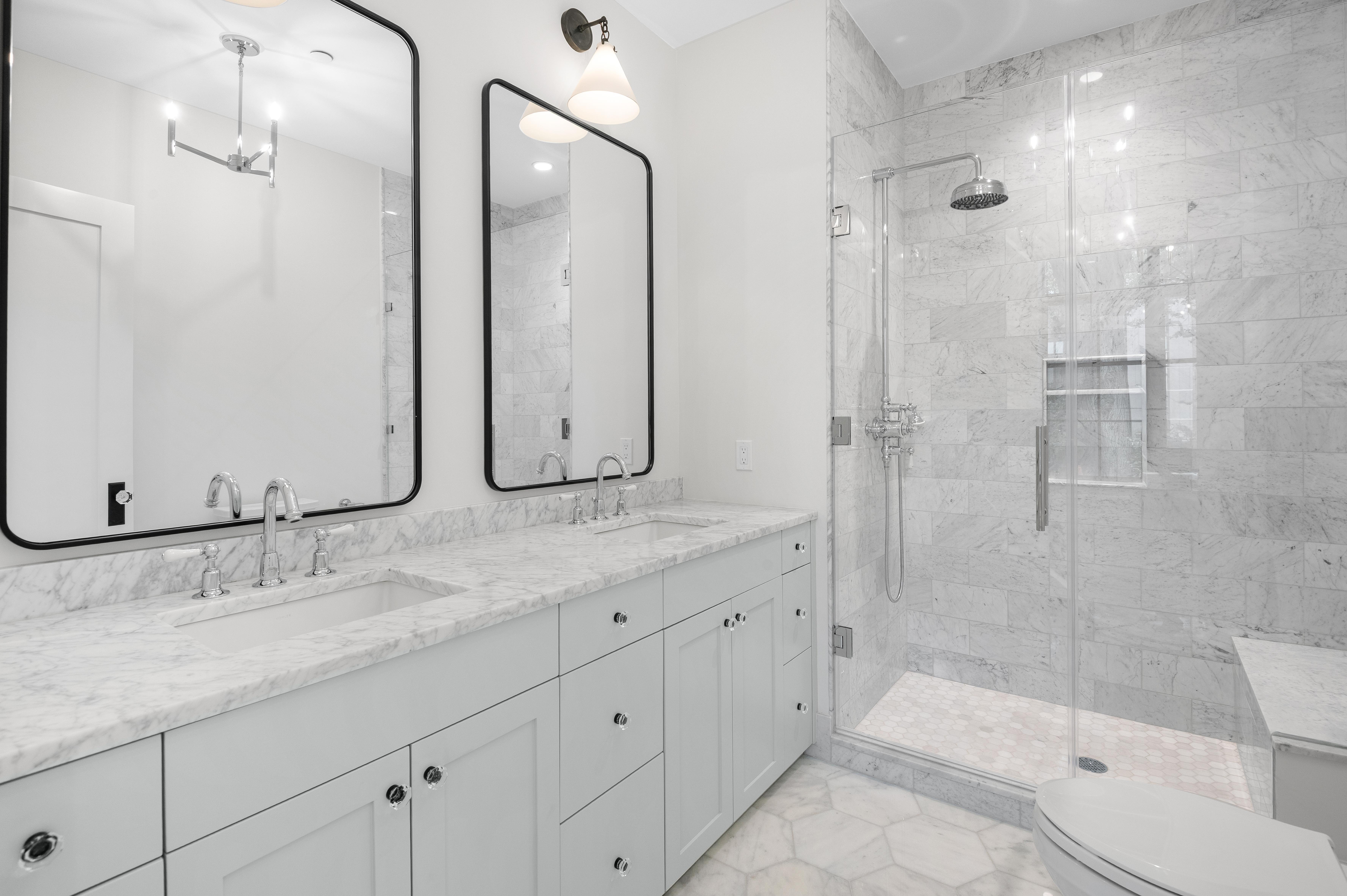 16 2nd Place, Unit RESIDENCE 2 Brooklyn, NY 11231 - Photo 11 of 20 a bathroom with a granite countertop sink mirror and shower