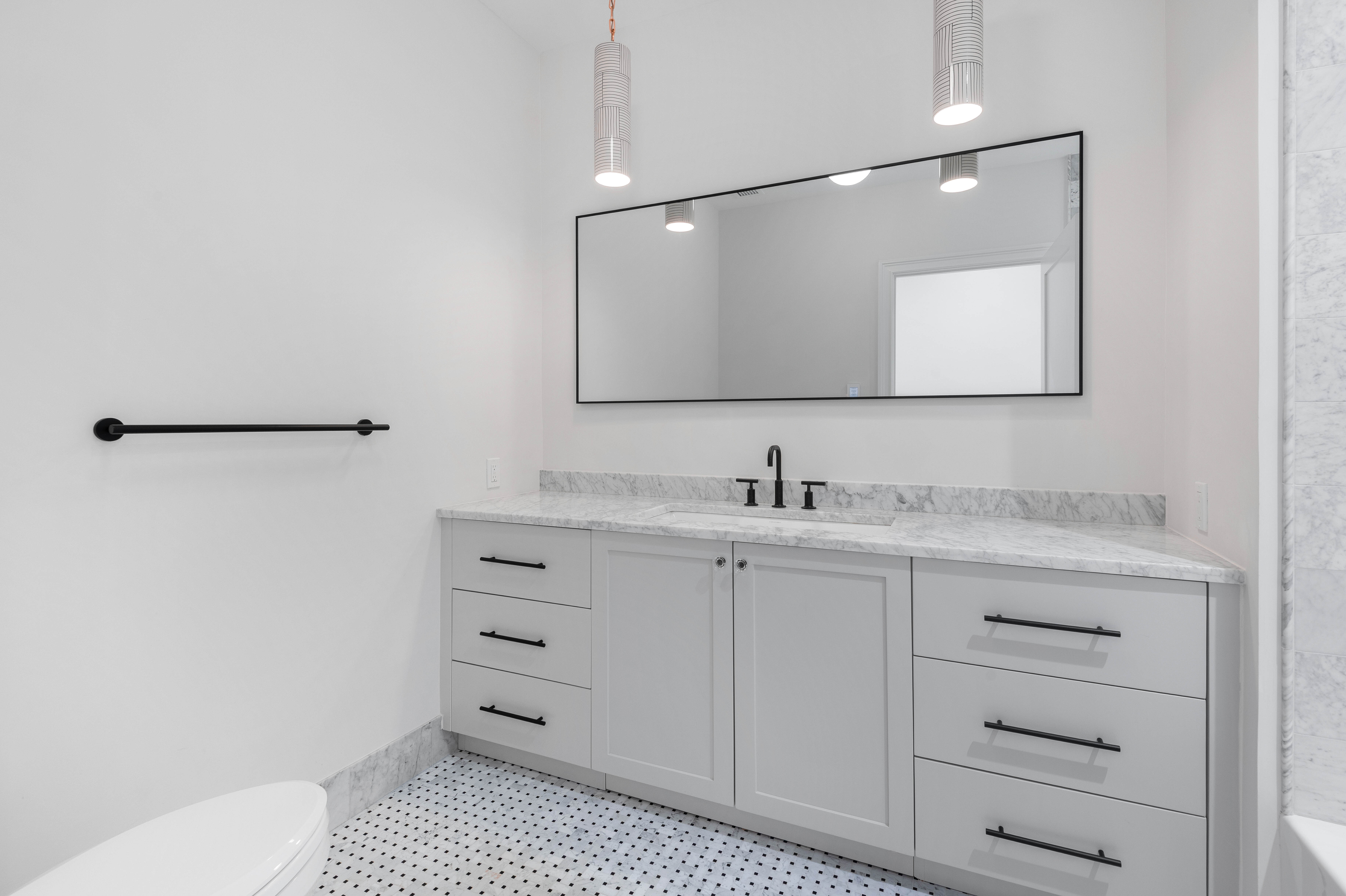 16 2nd Place, Unit RESIDENCE 2 Brooklyn, NY 11231 - Photo 15 of 20 a bathroom with a sink a vanity and a mirror