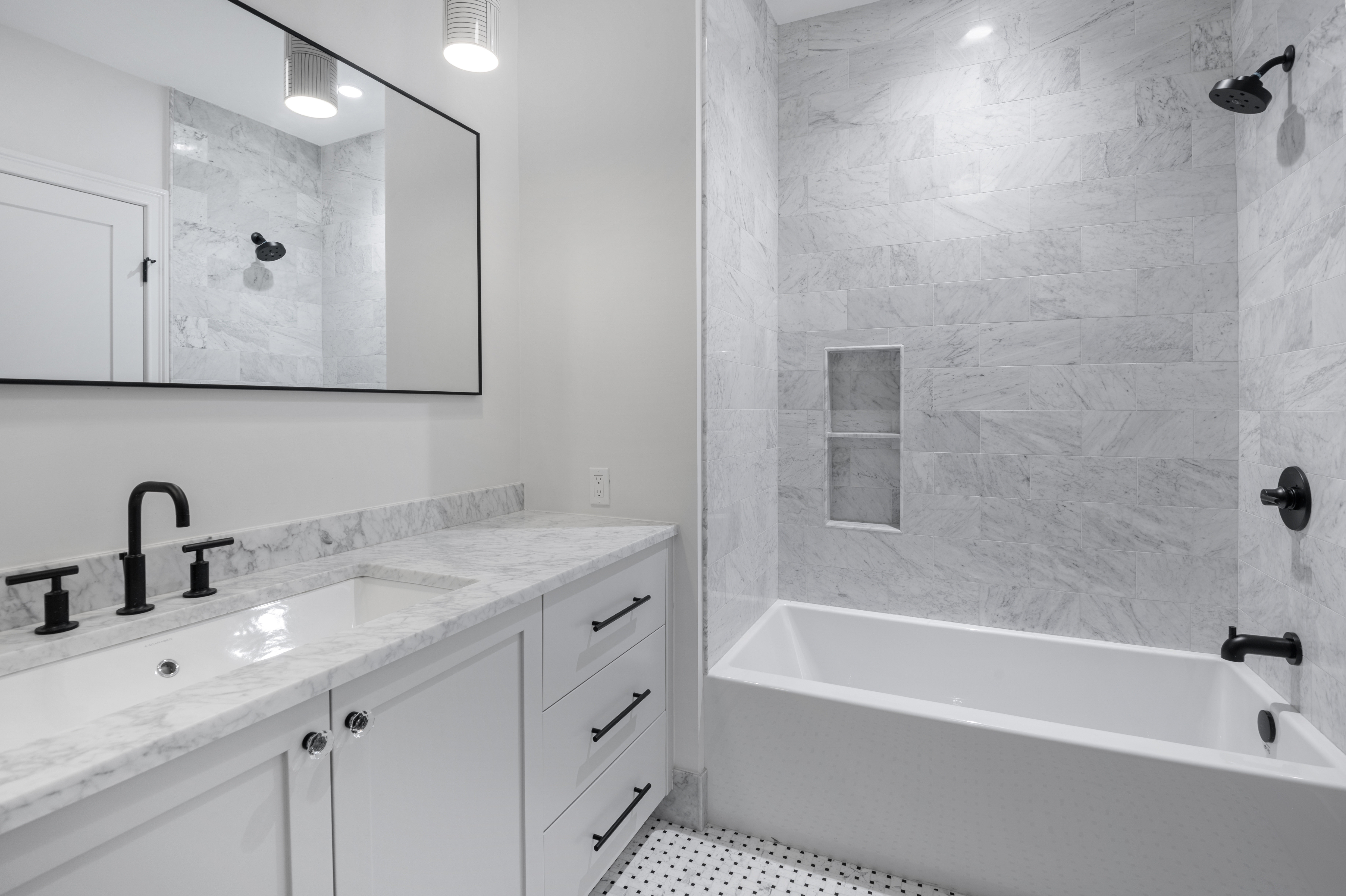 16 2nd Place, Unit RESIDENCE 2 Brooklyn, NY 11231 - Photo 16 of 20 a bathroom with a tub sink and mirror