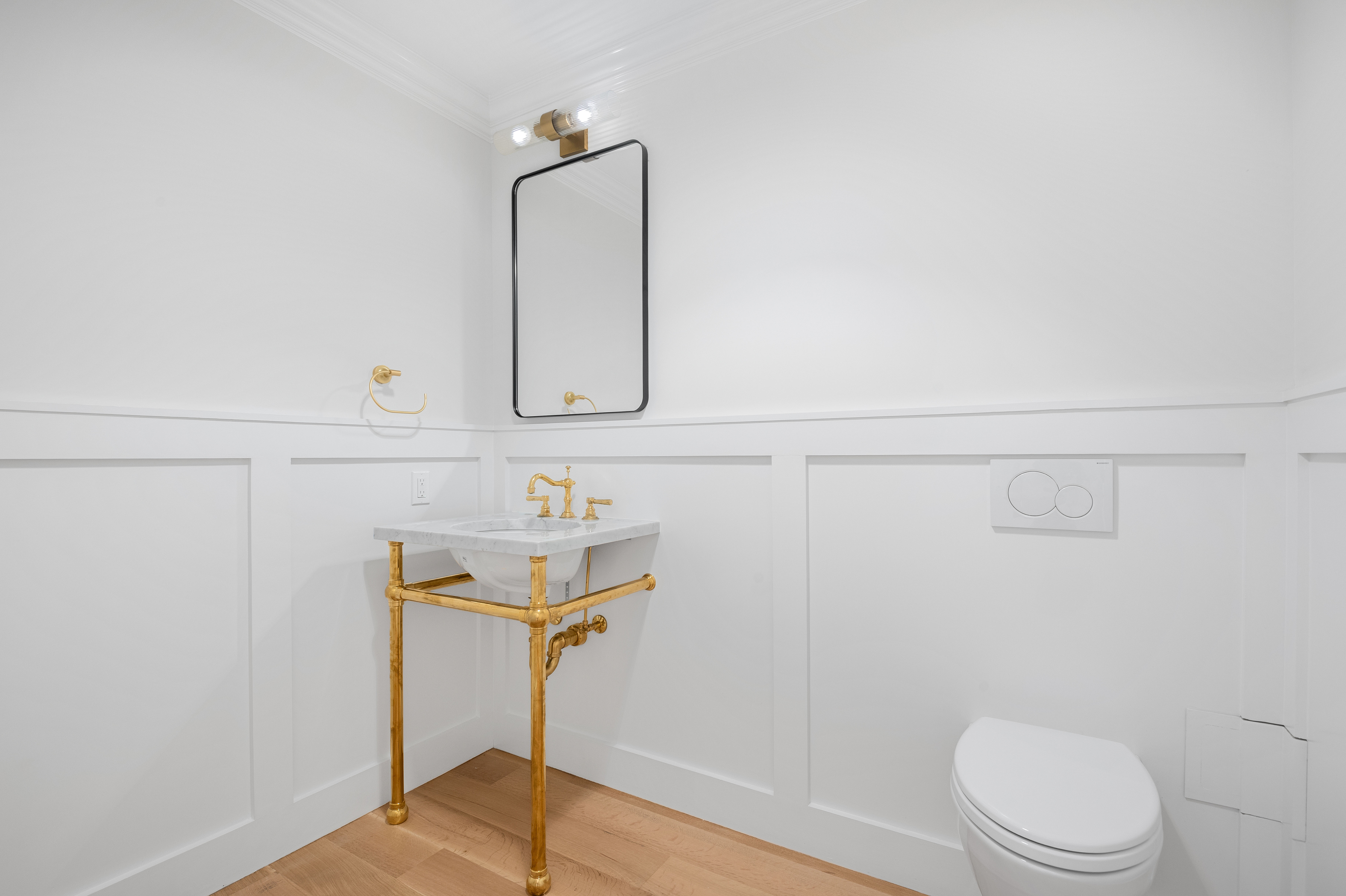 16 2nd Place, Unit RESIDENCE 2 Brooklyn, NY 11231 - Photo 7 of 20 a bathroom with a sink a toilet and mirror