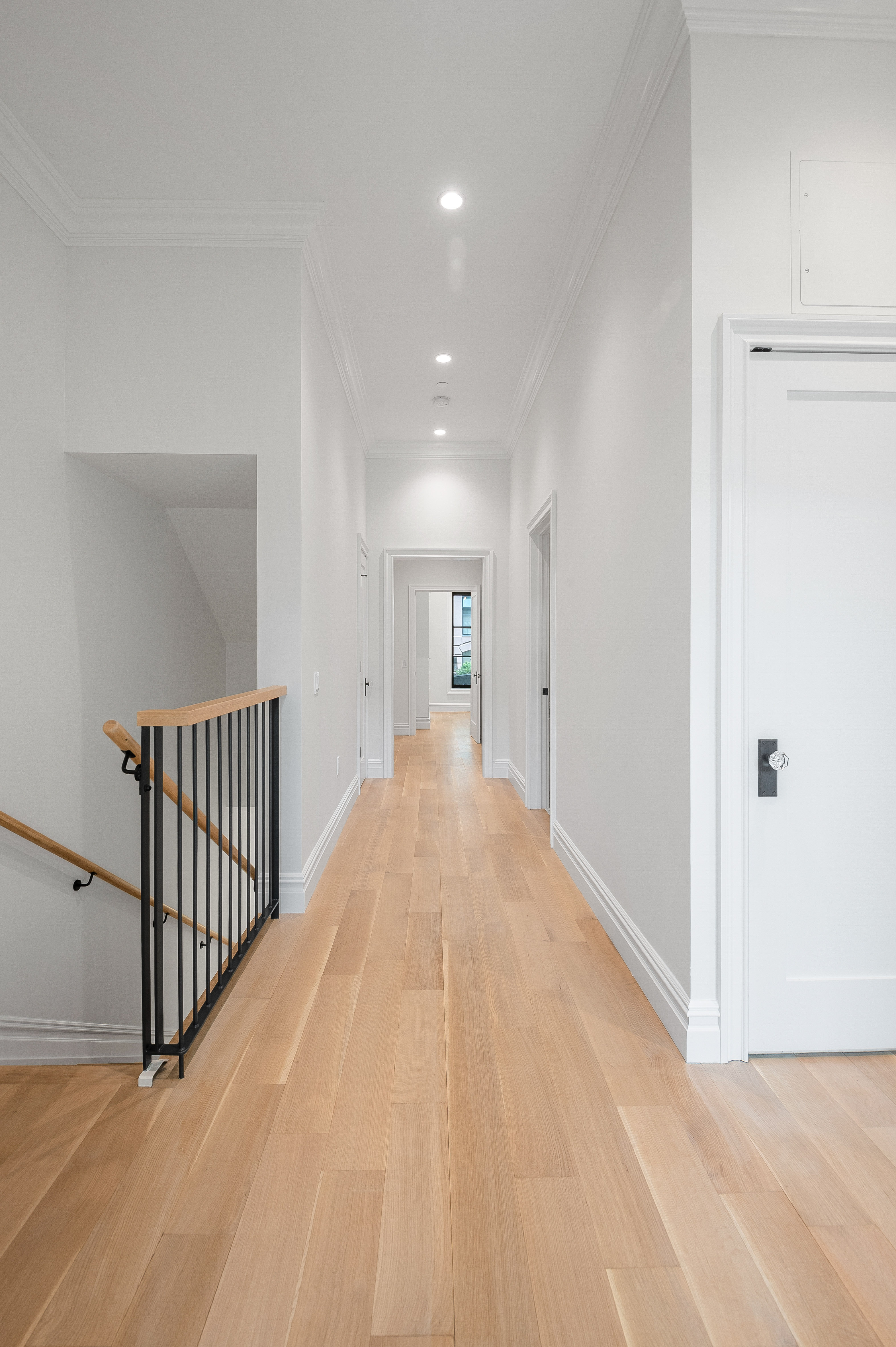 16 2nd Place, Unit RESIDENCE 2 Brooklyn, NY 11231 - Photo 9 of 20 a view of a hallway with wooden floor and staircase